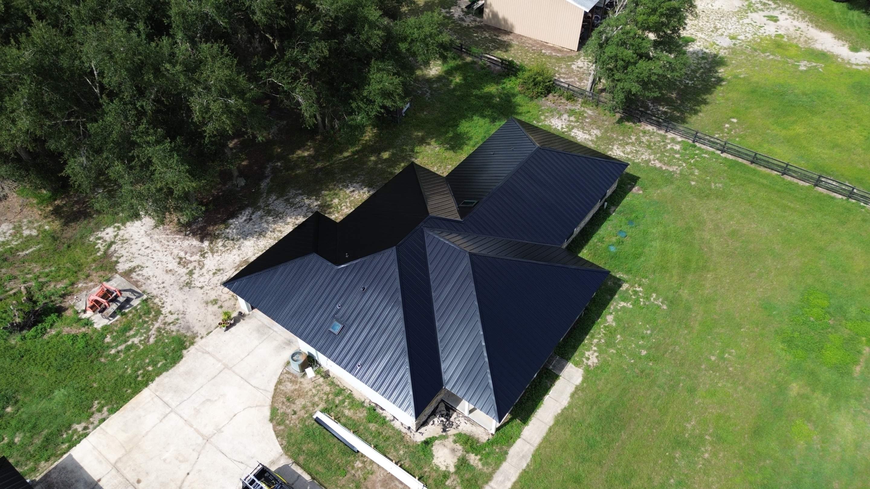 Residential Reroof | Architectural Shingles to 26 Gauge Standing Seam Metal | Groveland Fl by Gold Key Roofing
