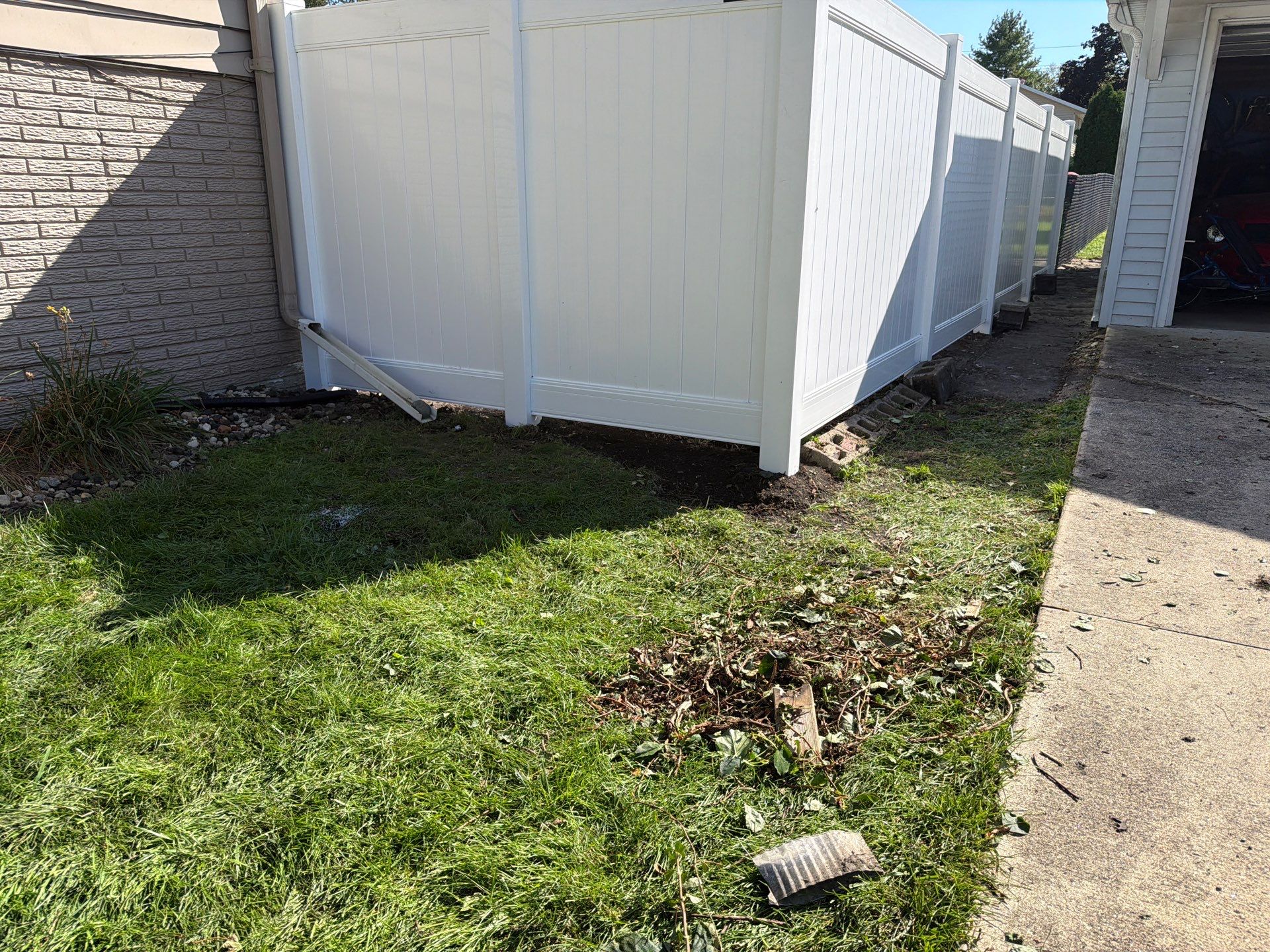 Custom Vinyl Privacy and Black Chain Link Fence Installation in Cedar Falls by Perfect Picket Fence and Stain
