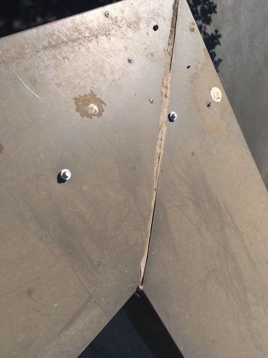 Spray foam and coatings inside commercial building HVAC well using Spray foam and coatings over existing BUR system by Straight Edge Roofing Inc