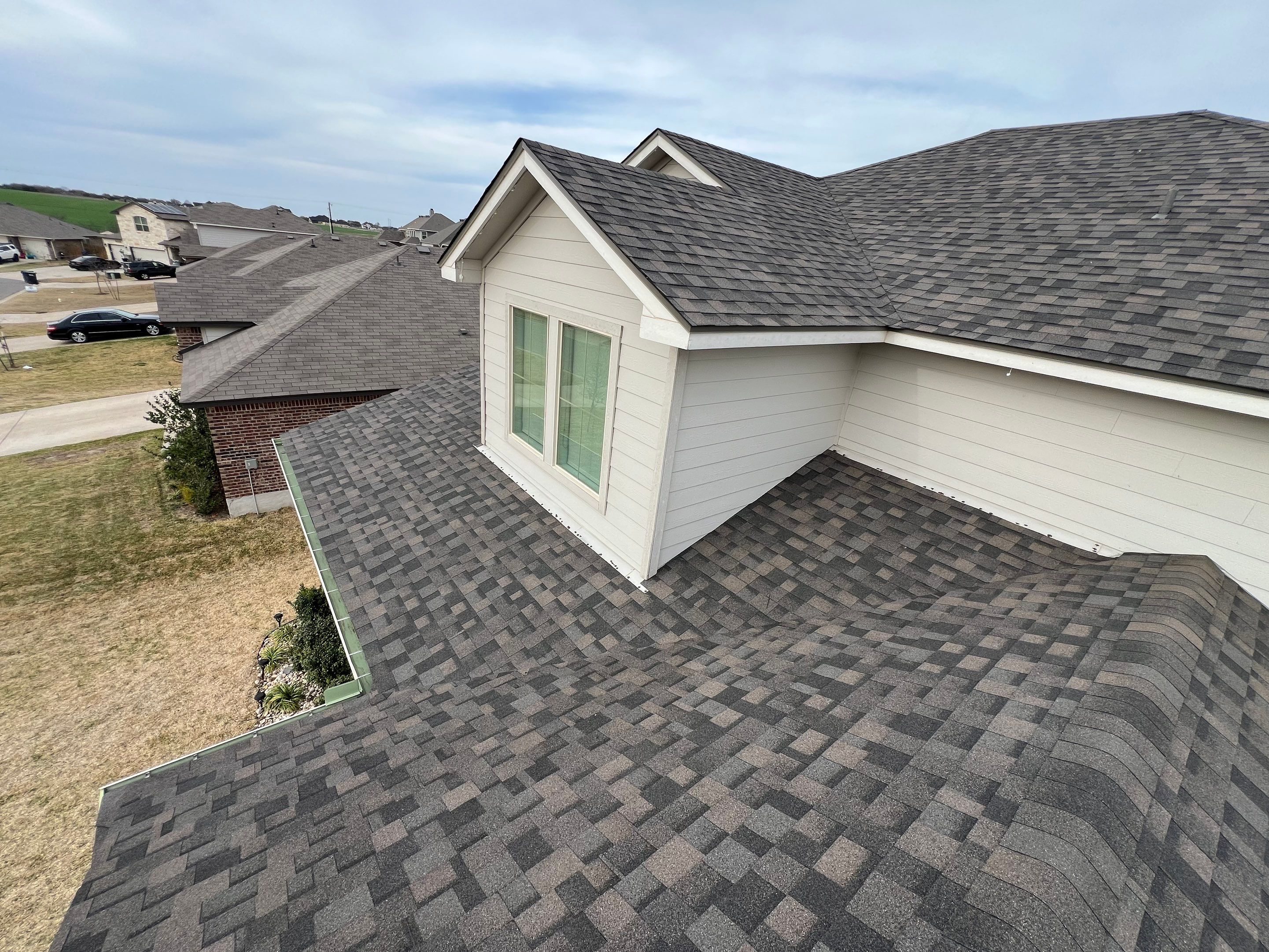 Residential Roofing Installation using IKO Dynasty Class 3 Impact Resistant 30YR Architectural Shingles. Color: Driftshake by WR Roofing Solutions