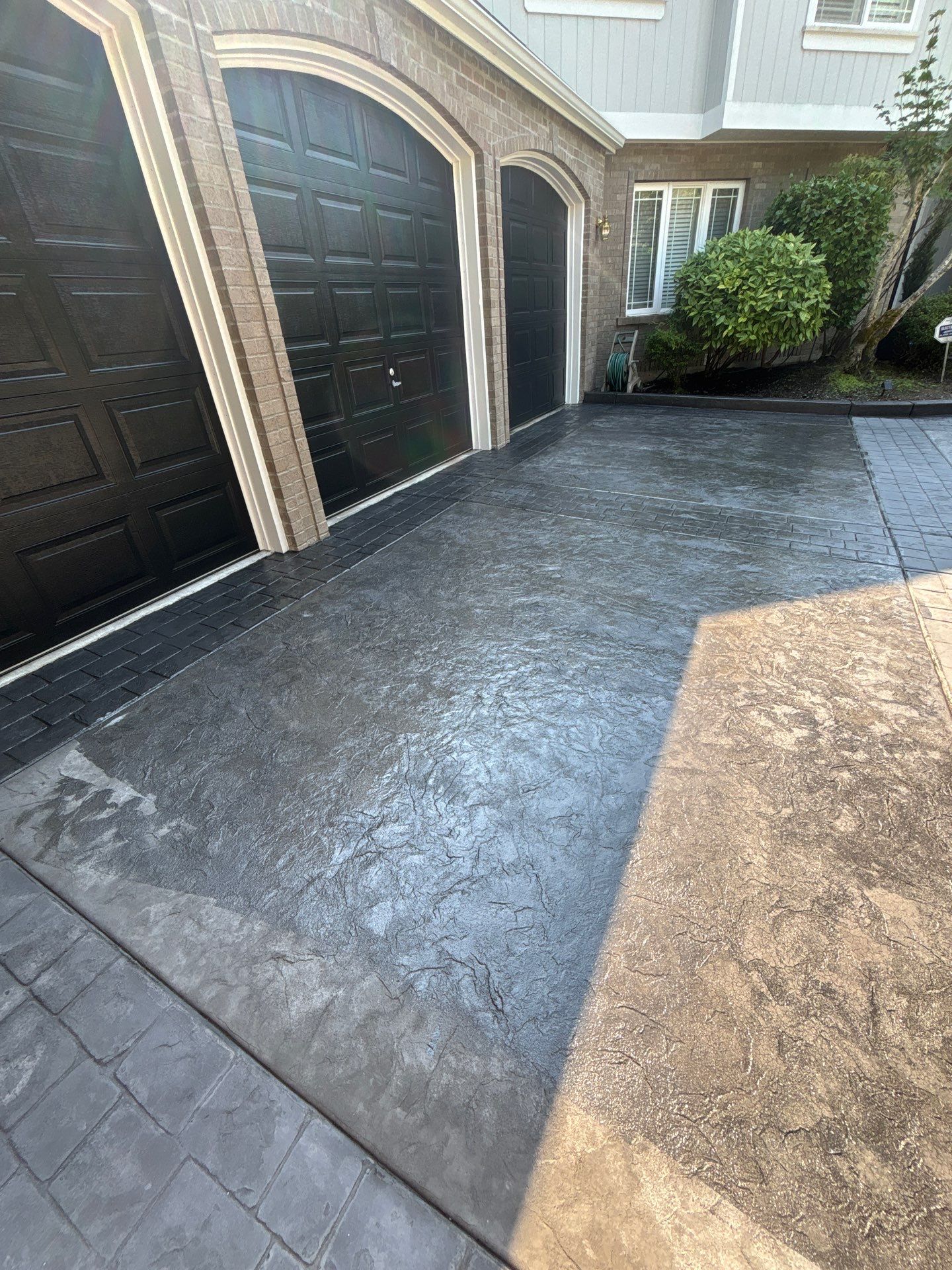 Multi-color Stamped & Sealed Concrete Driveway Renovation | Mukilteo by Jireh Asphalt & Concrete Inc
