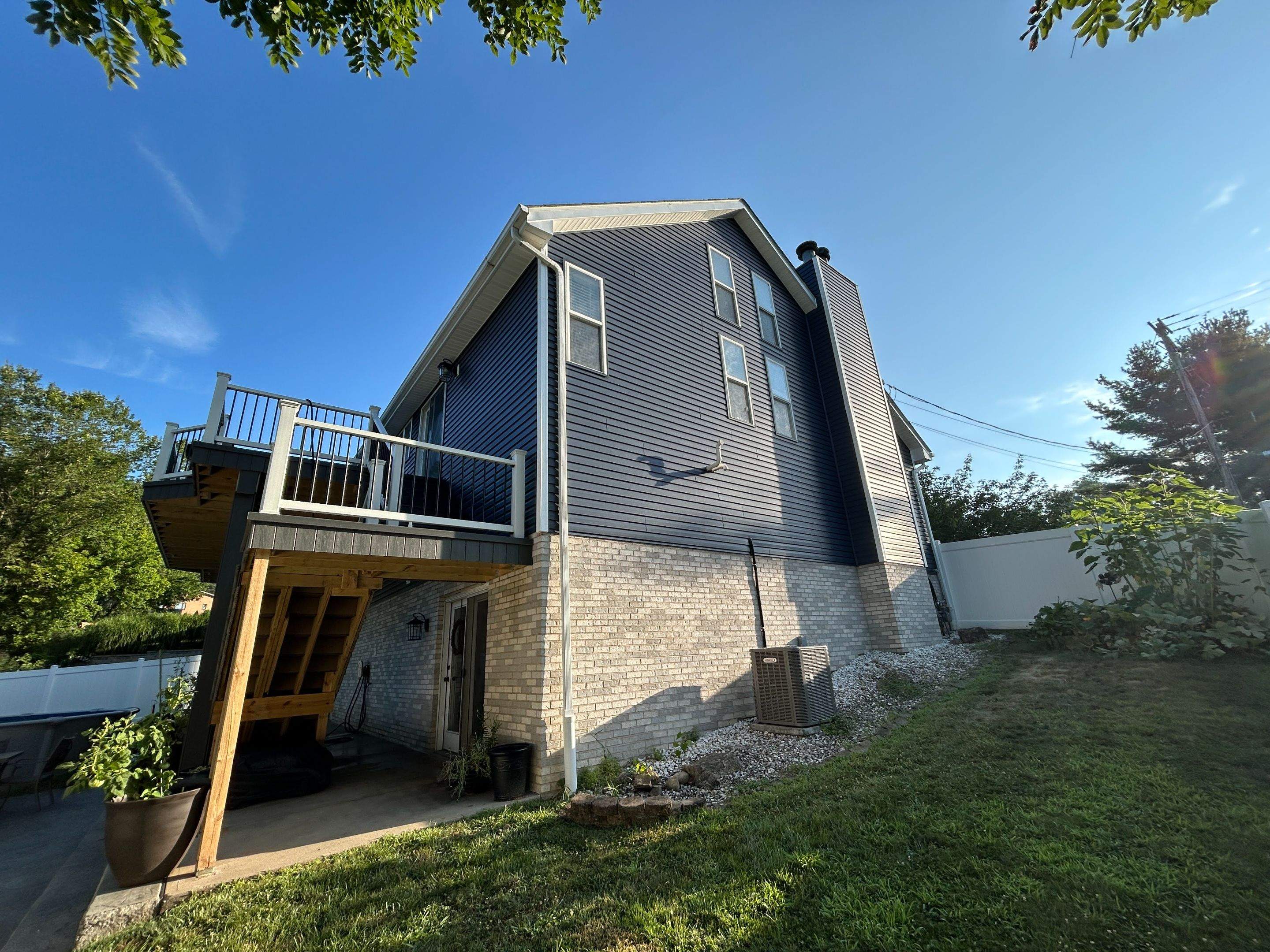 Vinyl Siding Renovation and Stone Veneer Upgrade in Carnegie by Ideal Siding Pittsburgh