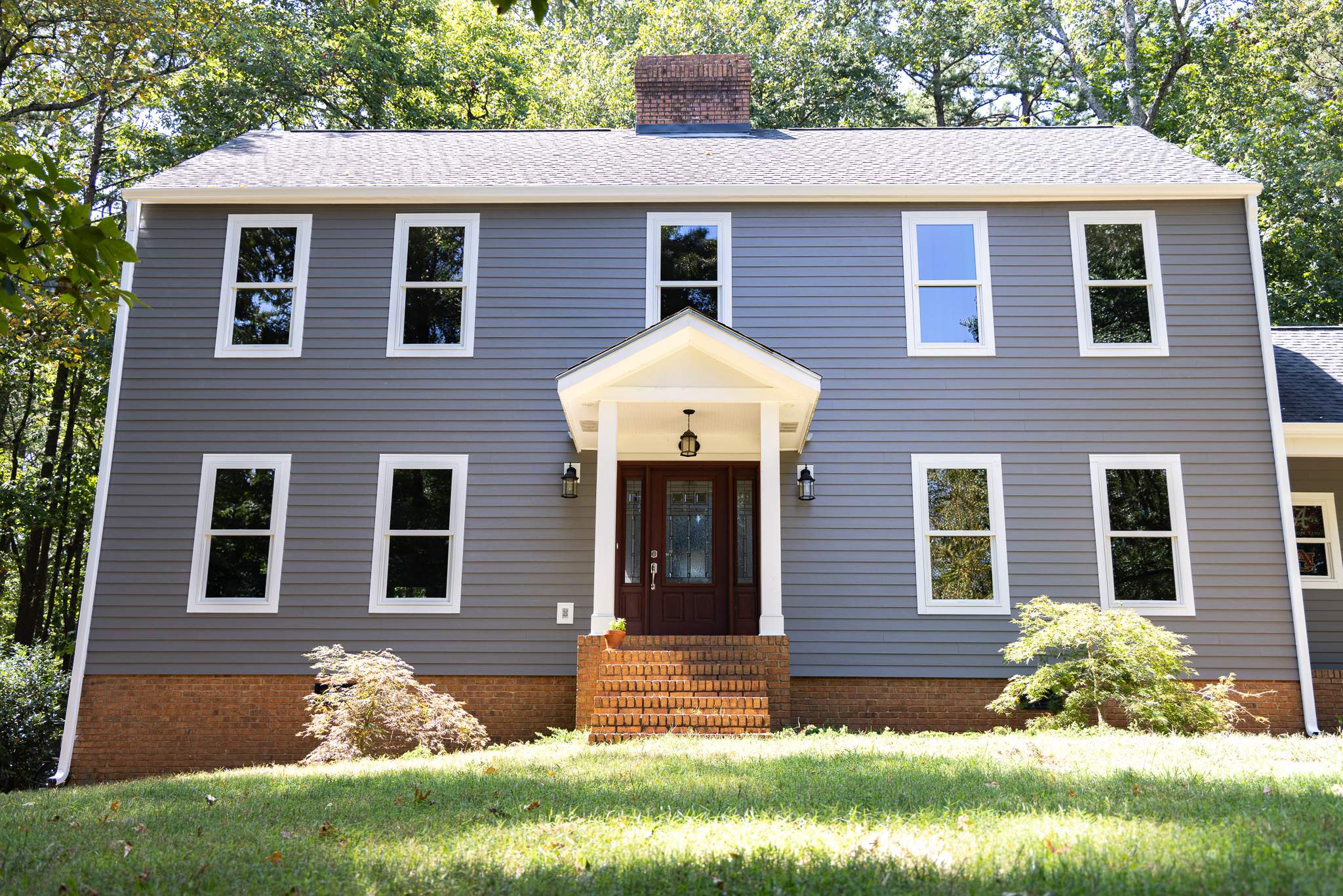 Aged Pewter Hardie + Windows by Freedom Exteriors