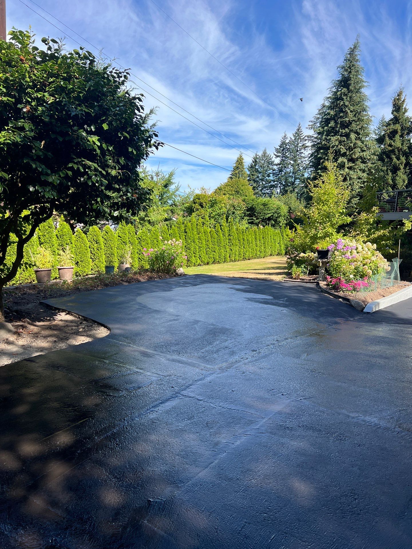 Epoxy Stairs & Sealcoat Driveway Application by Jireh Asphalt & Concrete Inc 