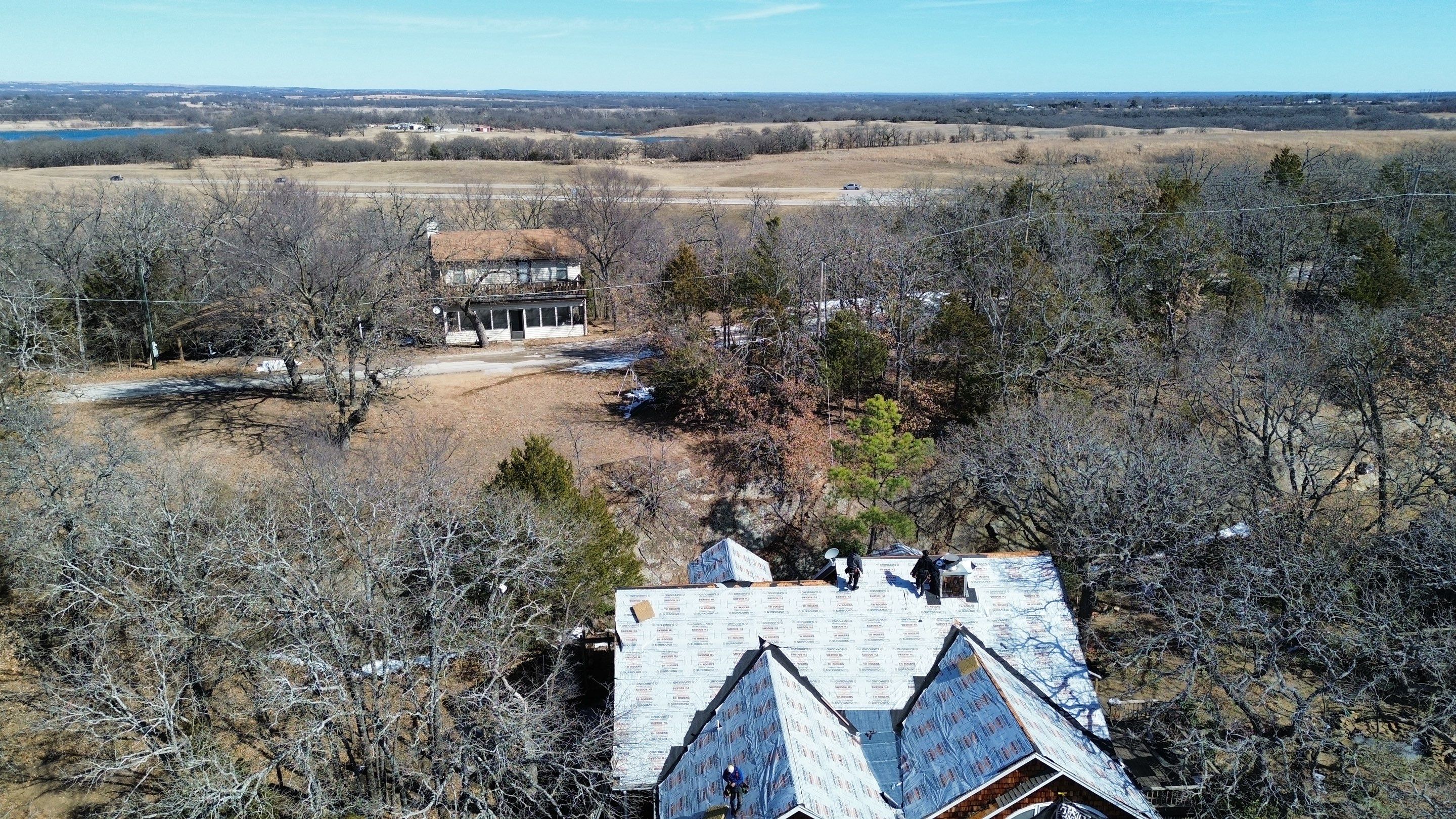 Roof Replacement on a private lake near Ardmore by BANA Roofing and Solar Supply