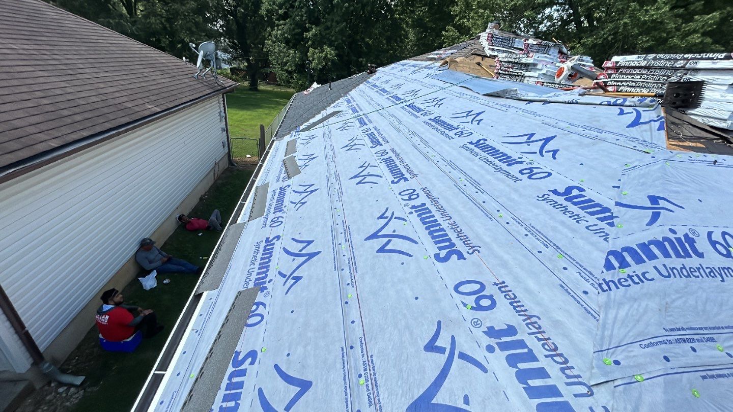 Residential Roof + Gutters & Downspouts Install  by Titan Commercial & Residential Roofing 