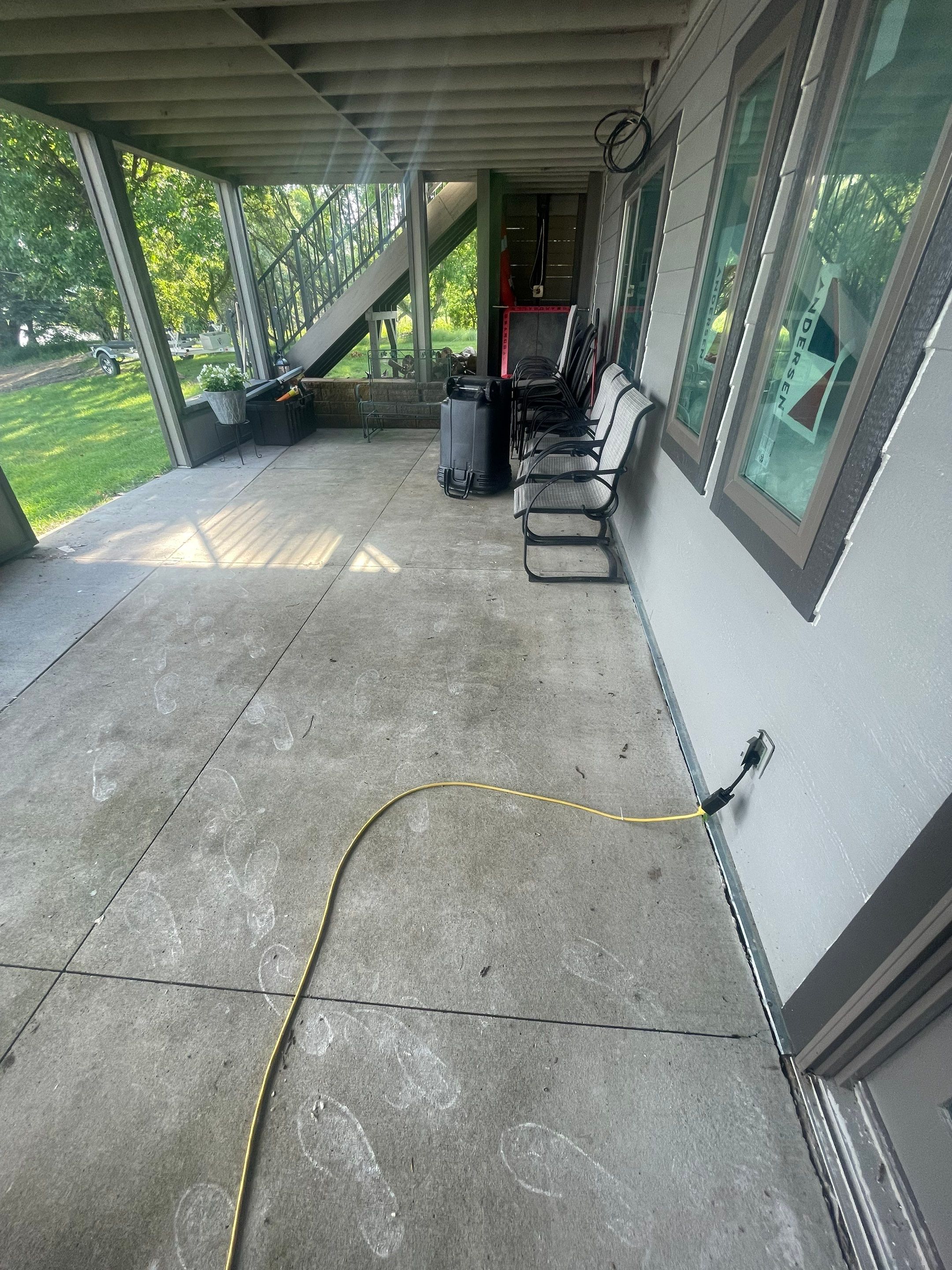 Lakefront Screened Patio Concrete Coating Installation in Wentworth by Select Painting, Coatings & Garage Cabinets