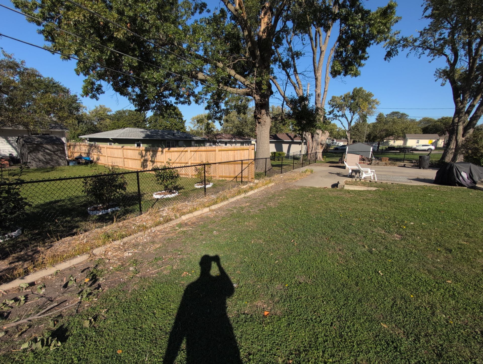 Black Chain Link Fence Installation for Waterloo Residential Property by Perfect Picket Fence and Stain