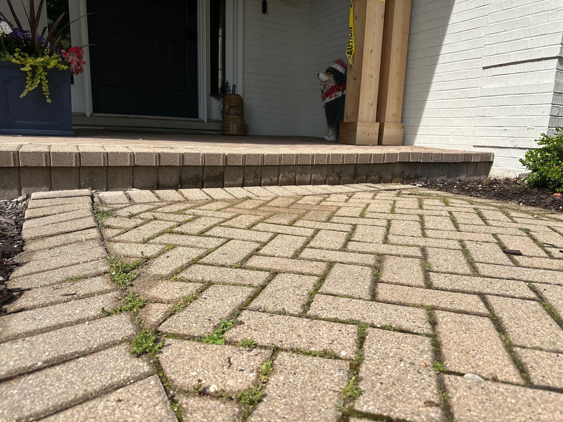 Brick paver repair, cleaning and sealing by Northern Power Washing LLC.