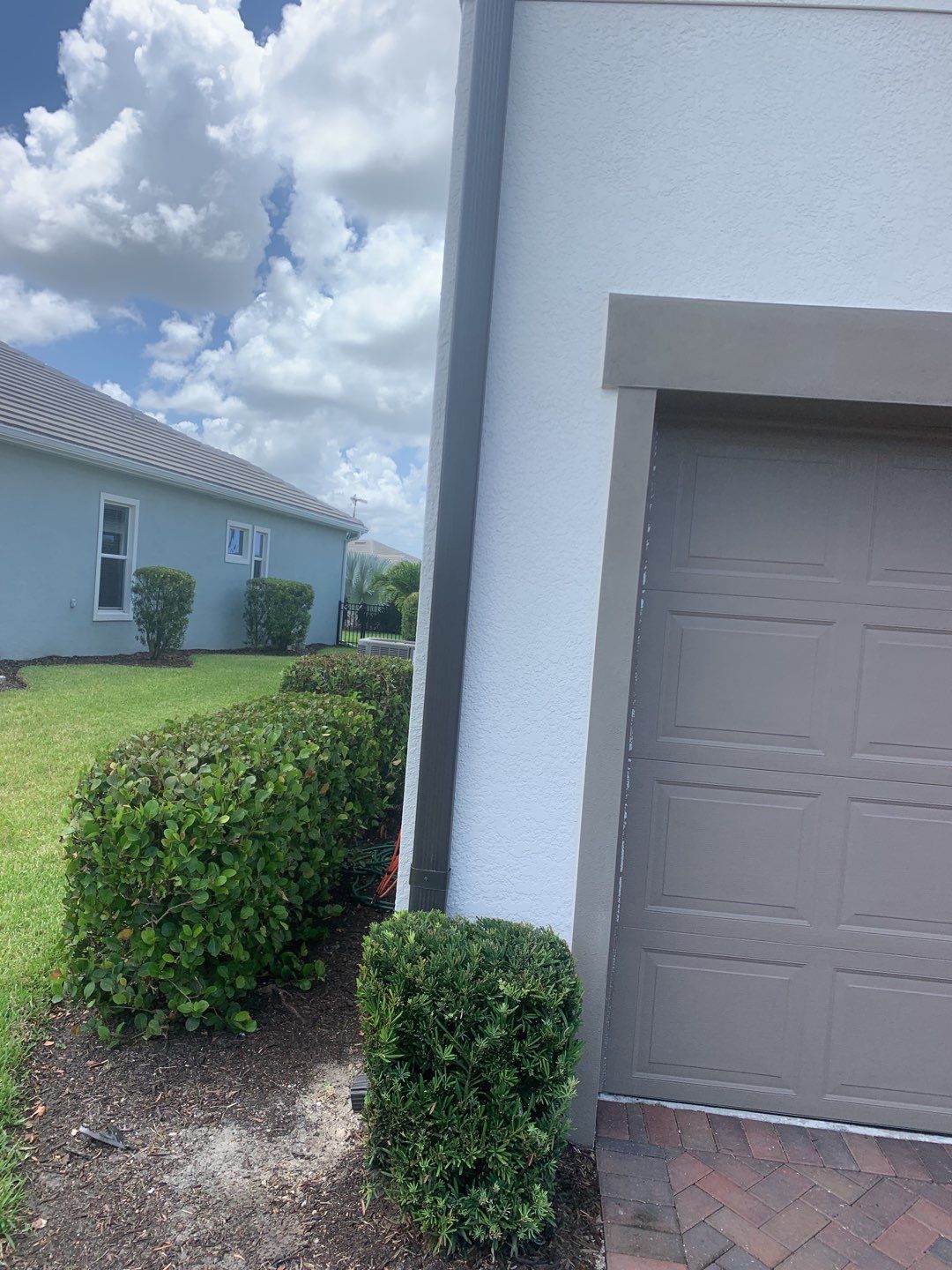 Black Seamless Gutters for Modern Homes in Naples FL  by Gutter Professors