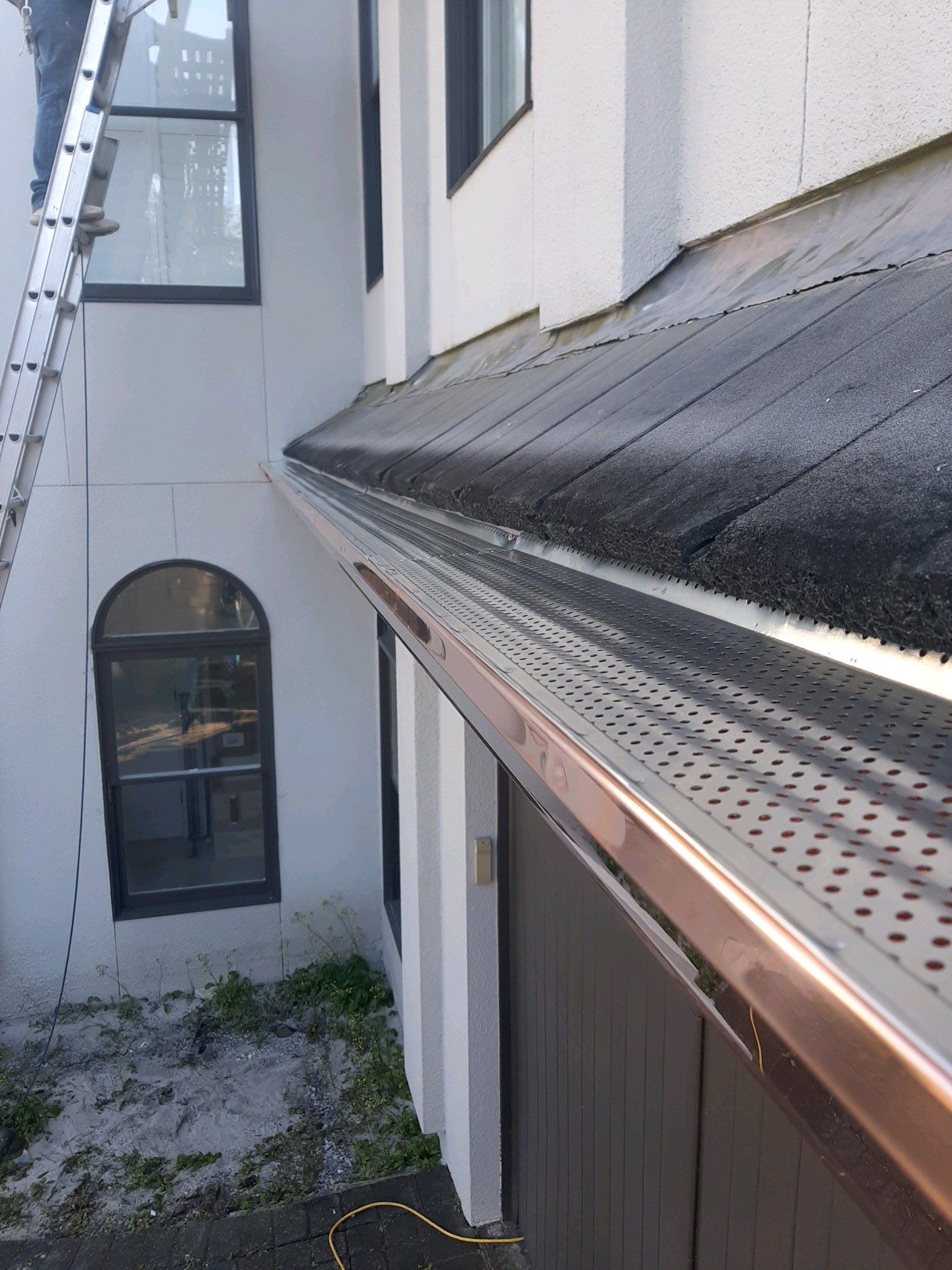 Seamless Gutter Installation Using Copper K- Style Gutters by Gutter Professors