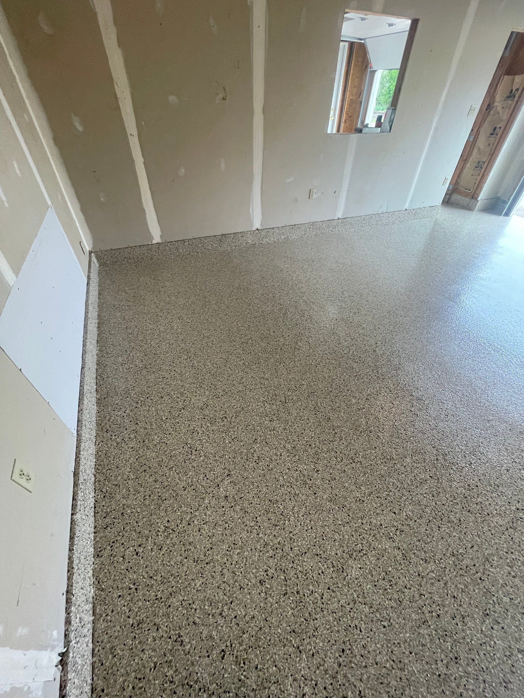 Speckled Epoxy Floor Coating Installation for Centerville Residential Garage by Select Painting, Coatings & Garage Cabinets