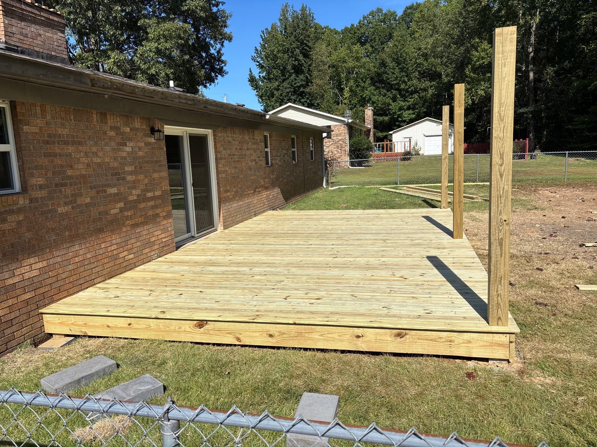 Front Entry Enhancements and a Back Deck Upgrade by Elite Proscapes LLC