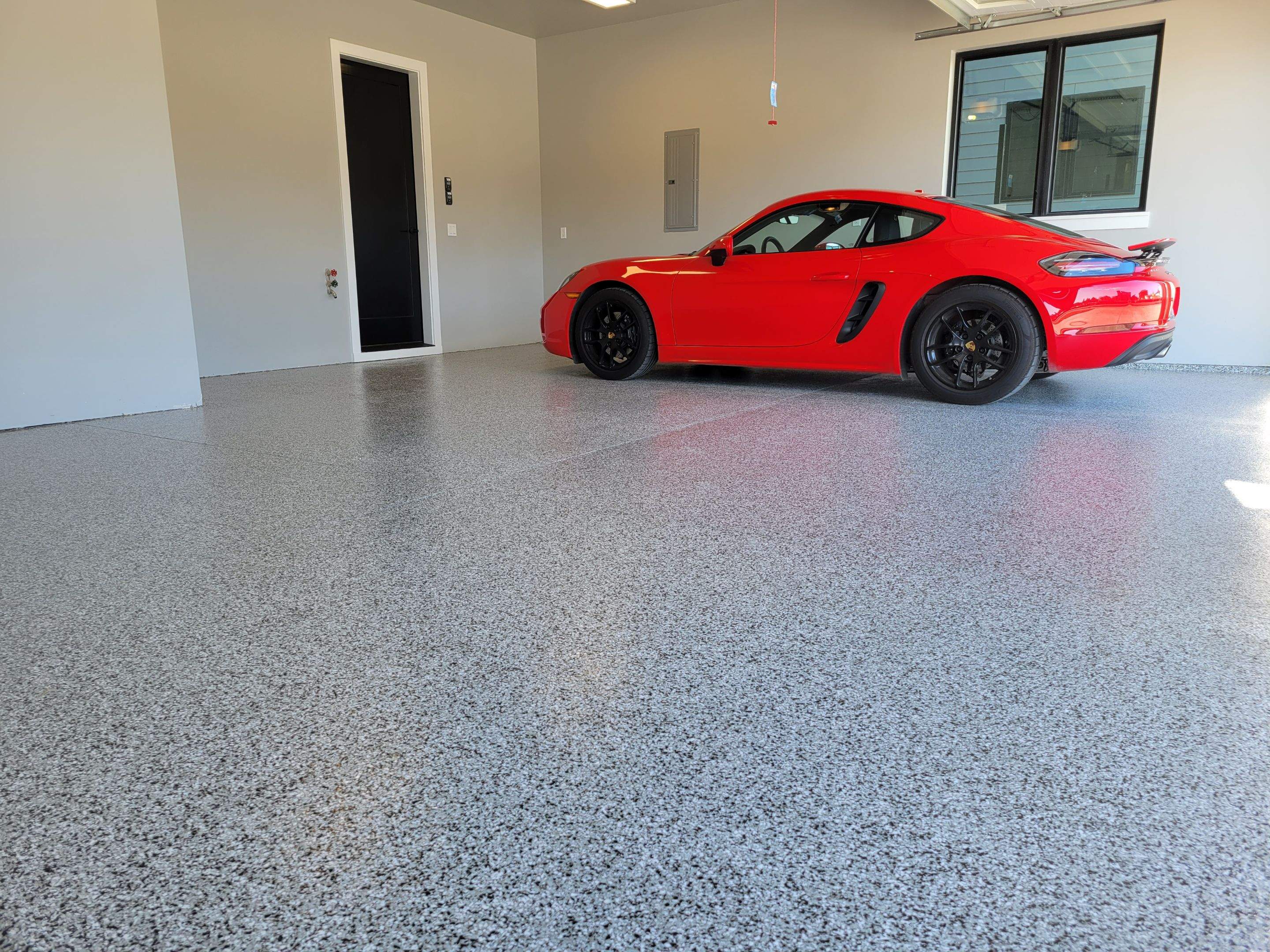 Garage Transformation using Domino by Croc Coatings, LLC