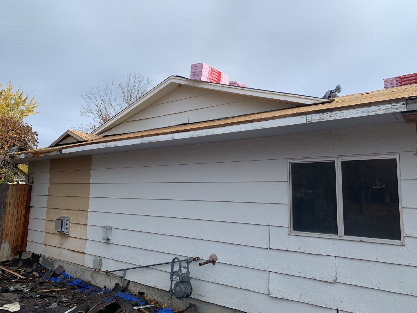 Boise single level low pitched roofing installation using Owens Corning in Teak by ID Roofing LLC