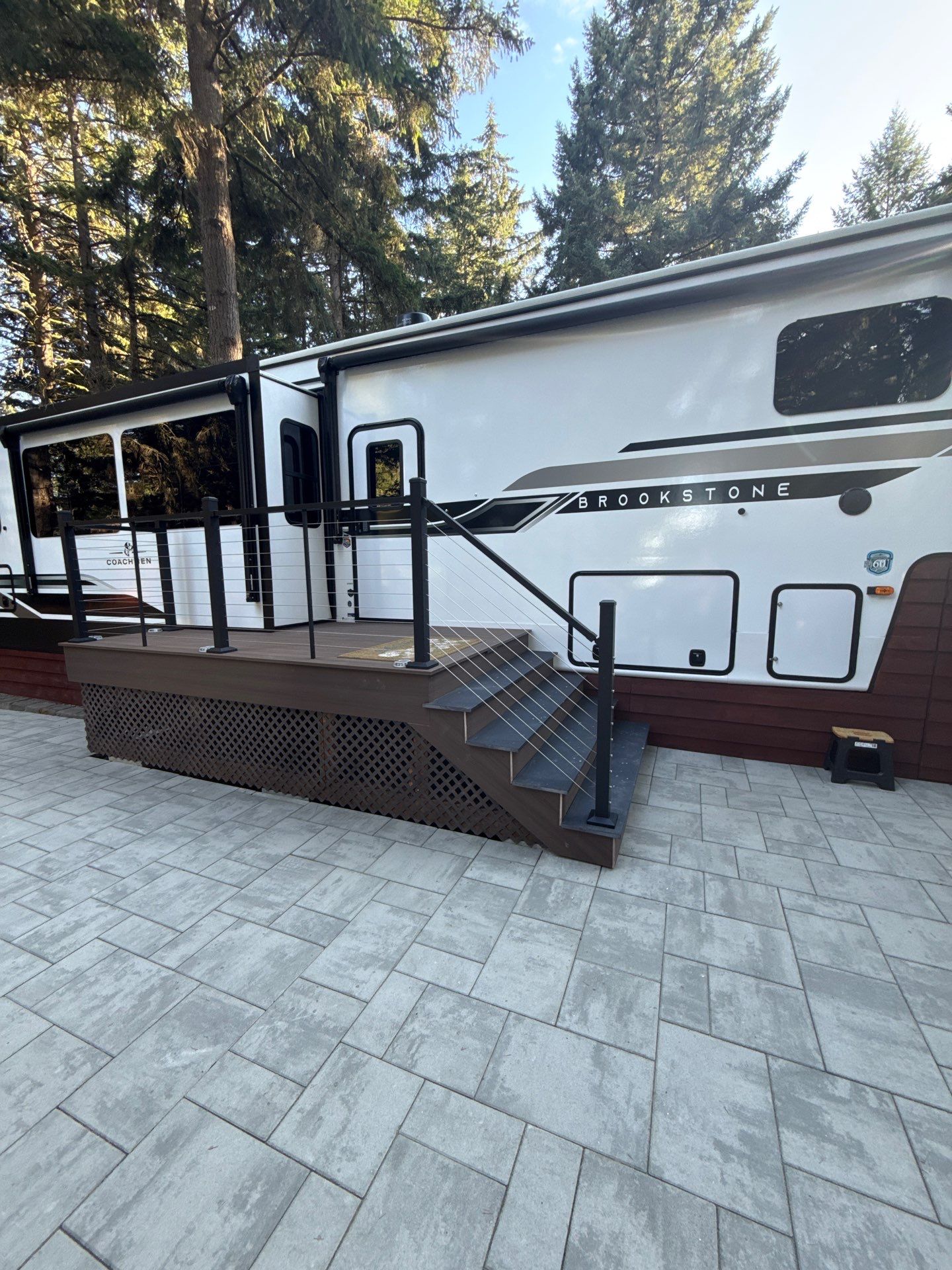 Custom Composite Deck with Cable Railing and Paver Patio in Olympia by Expedeck