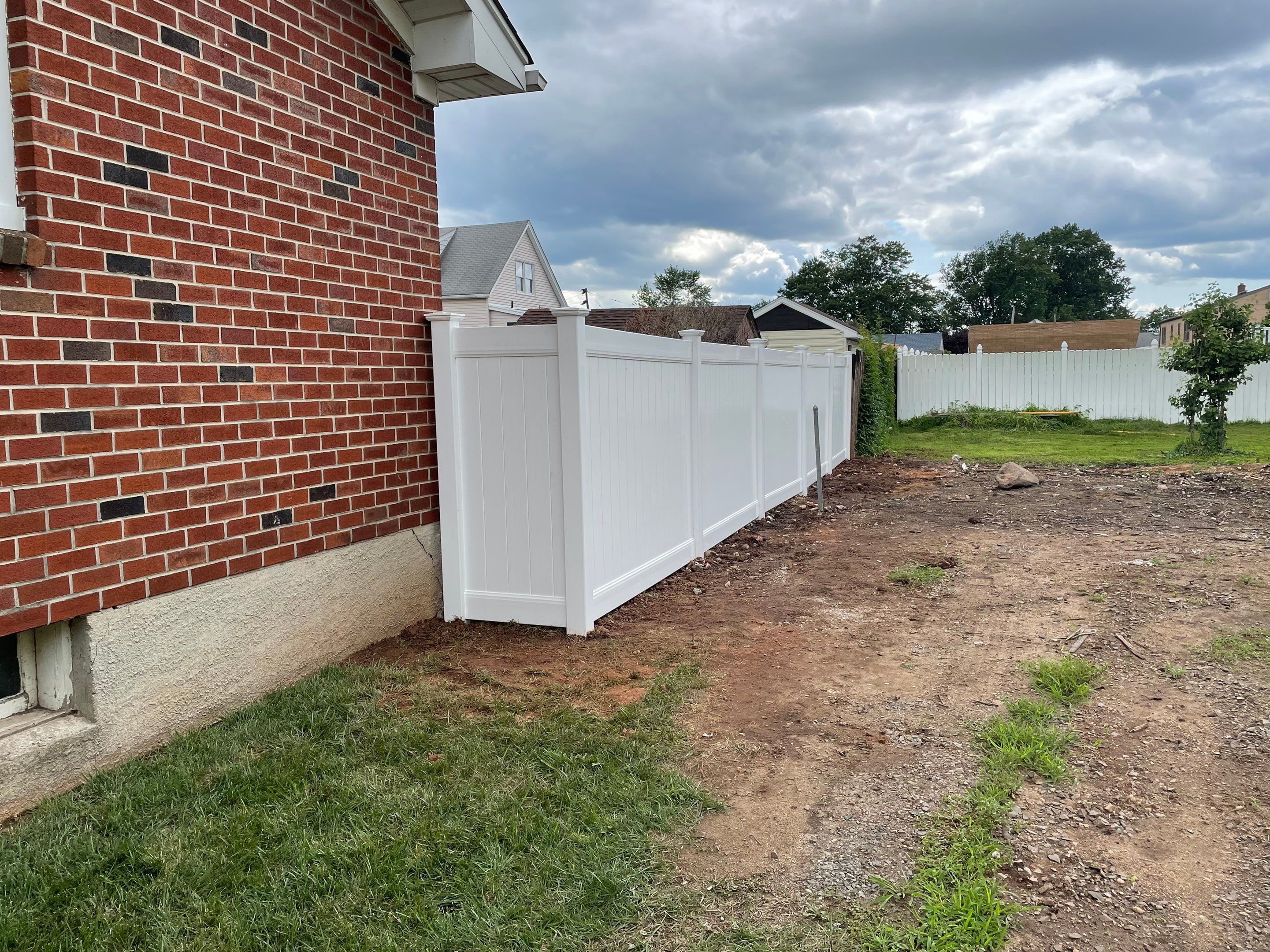 Fence Installation using White Fence by Home Concepts Construction