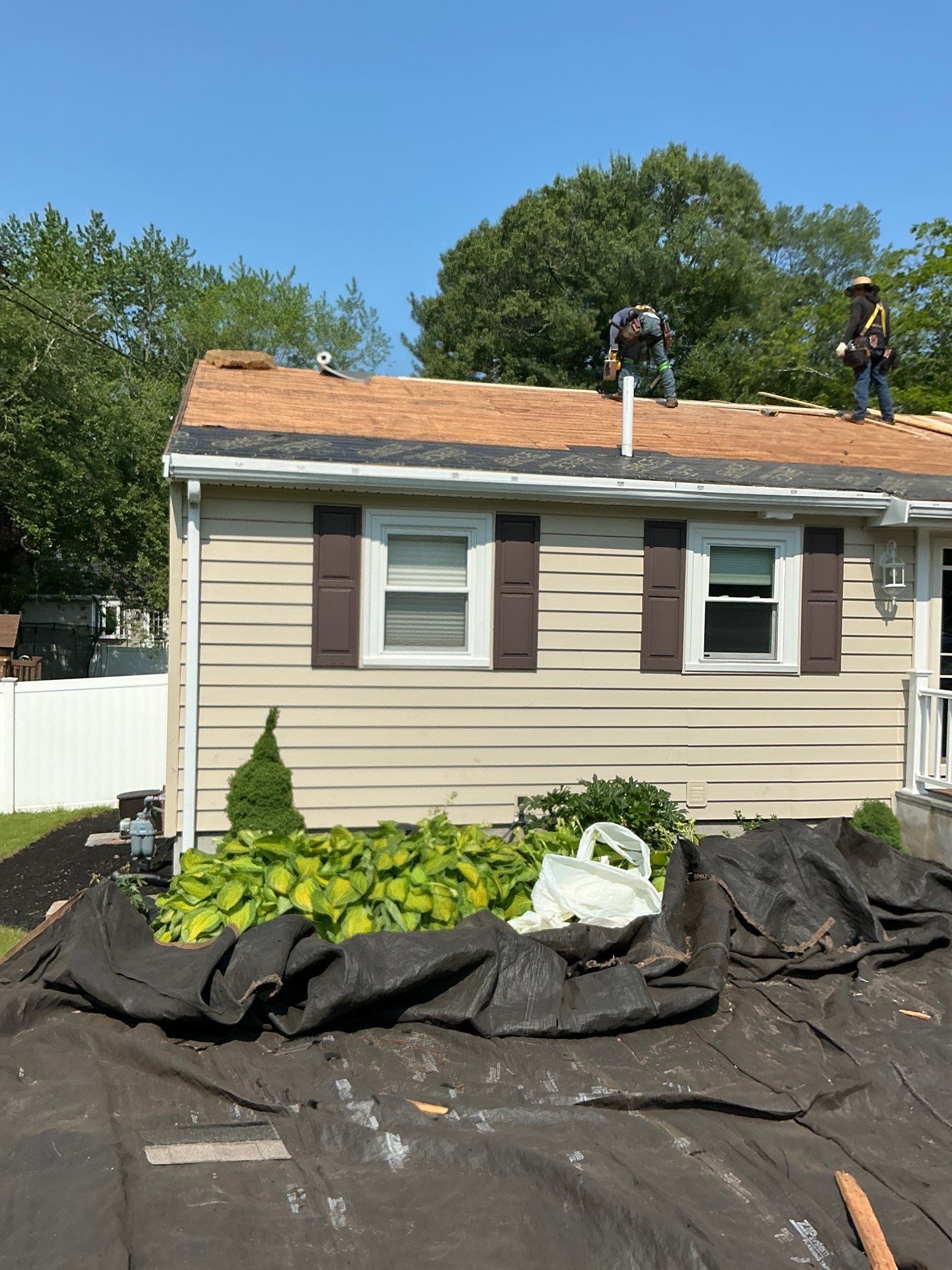 Full Roof Replacement & Chimney Repair – Onyx Black, MA by Mighty Dog Roofing of Greater Middlesex County