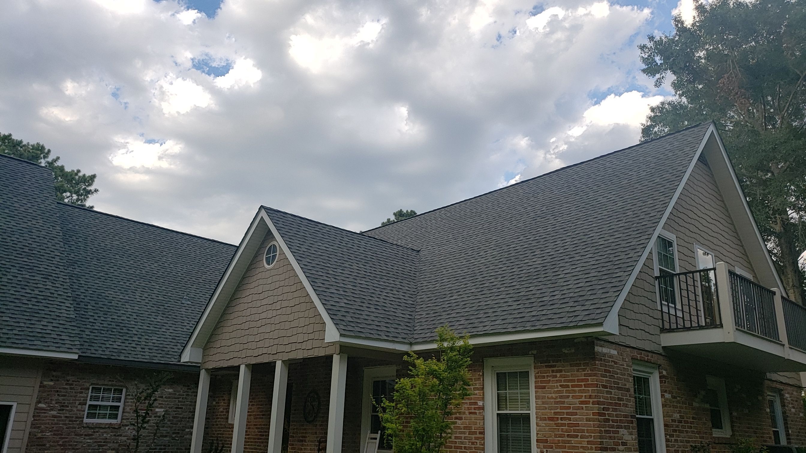 Residential Roofing Installation using Roof Replacement by American Roofing & Construction LLC