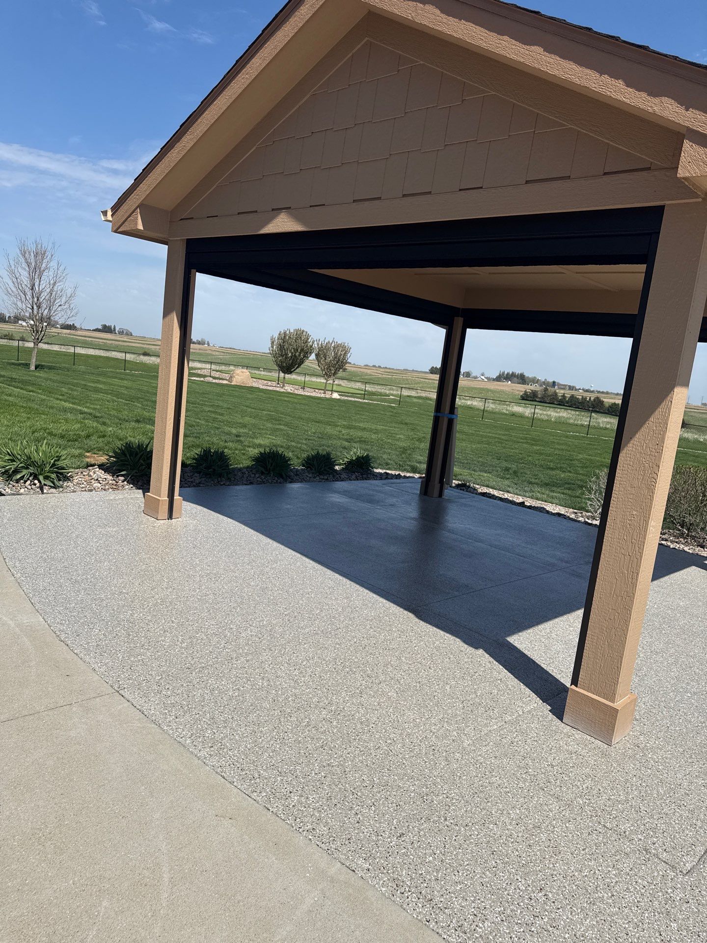 Winterset, IA Patio and Garage Bundle by Revival Concrete Coatings