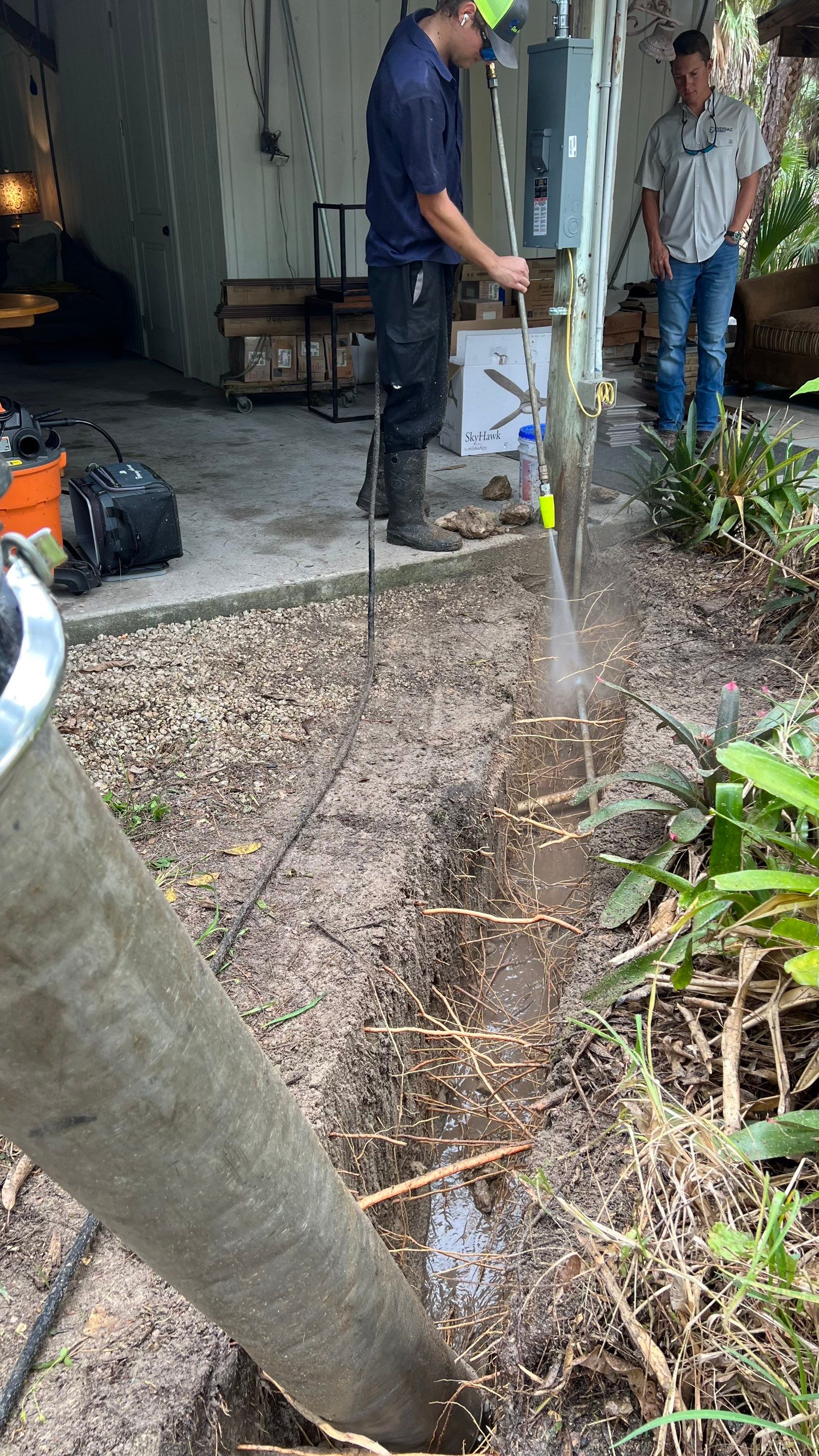 Hydro Excavating a Trench for Utility Lines by APS Power & Water