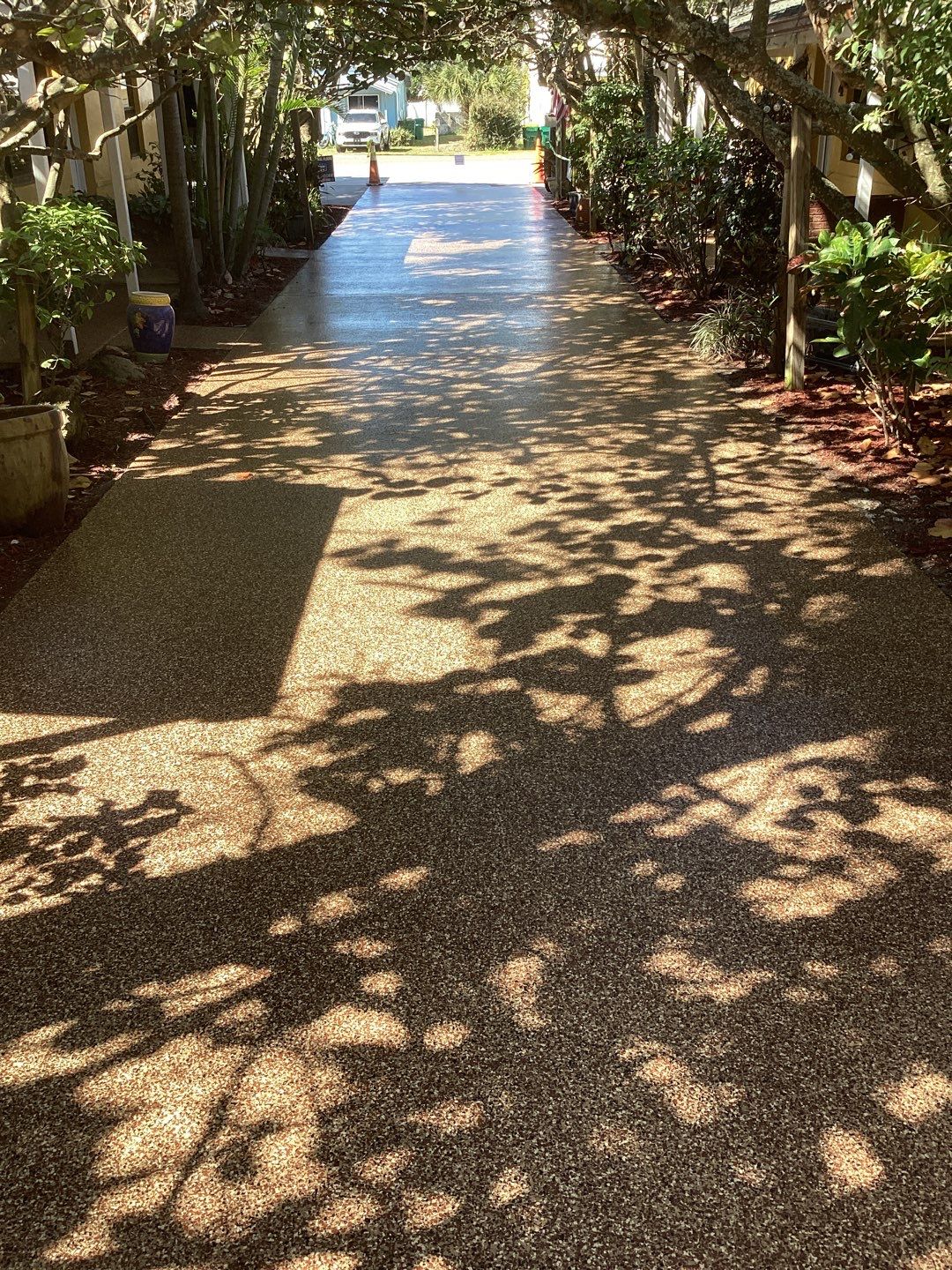 Sidewalks and Porches using Chestnut by Amvet concrete coatings llc