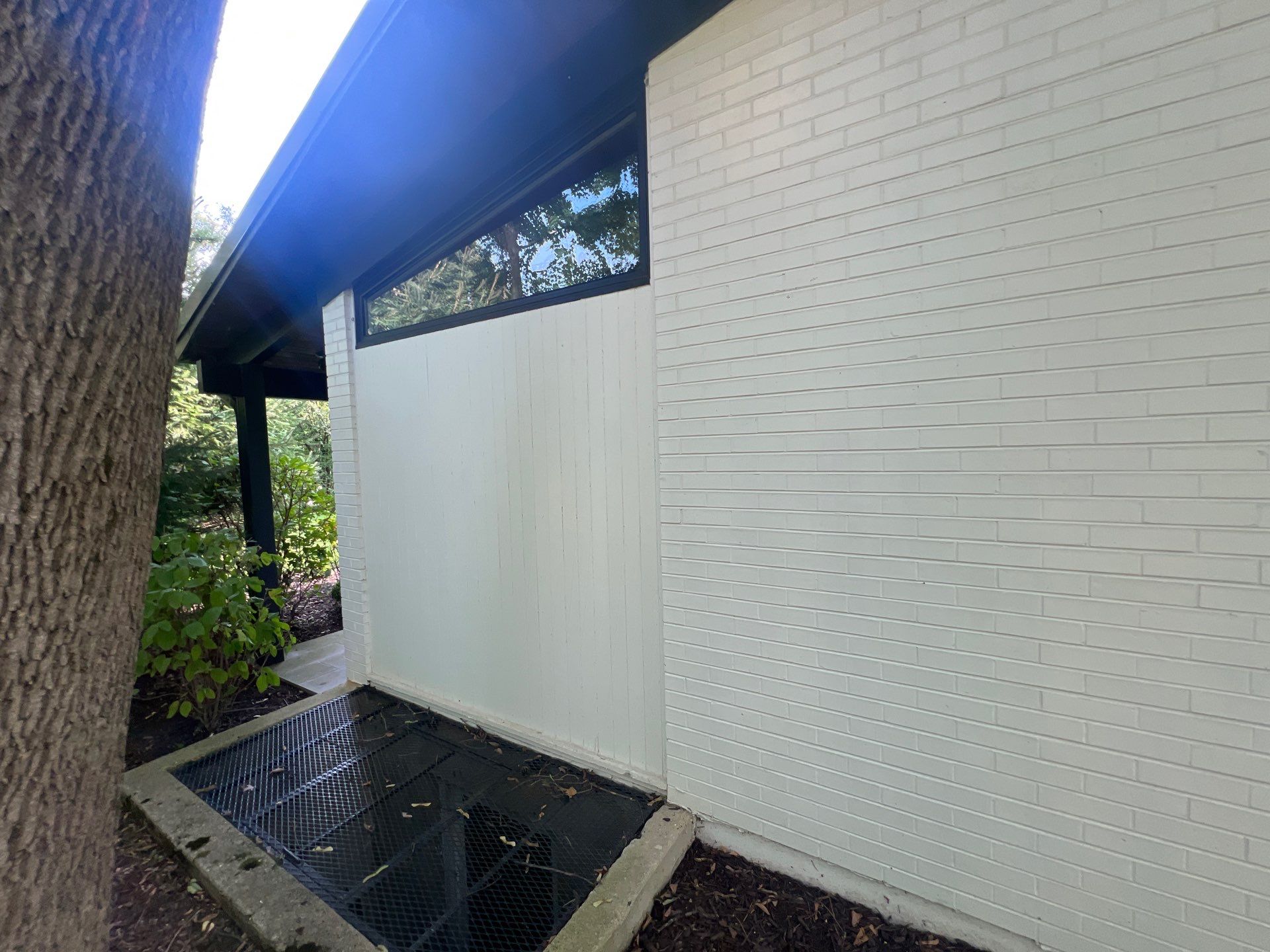Complete Exterior House, Bluestone & Garage Floor Cleaning by Northern Power Washing LLC.