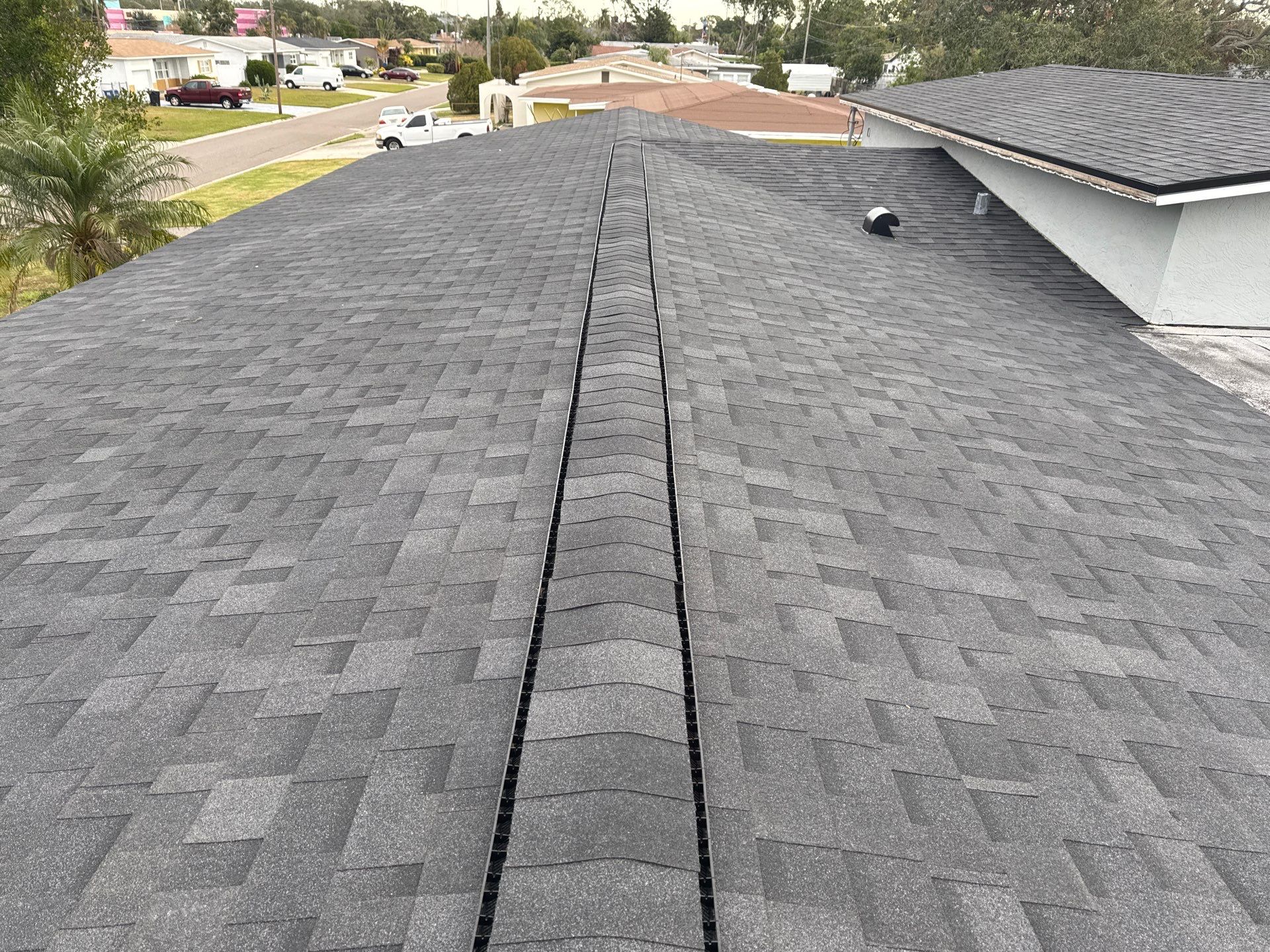 Estate Gray Shingles by Reimagine Roofing