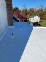 Roof Installation using Silicone TPO by ExteriorPros