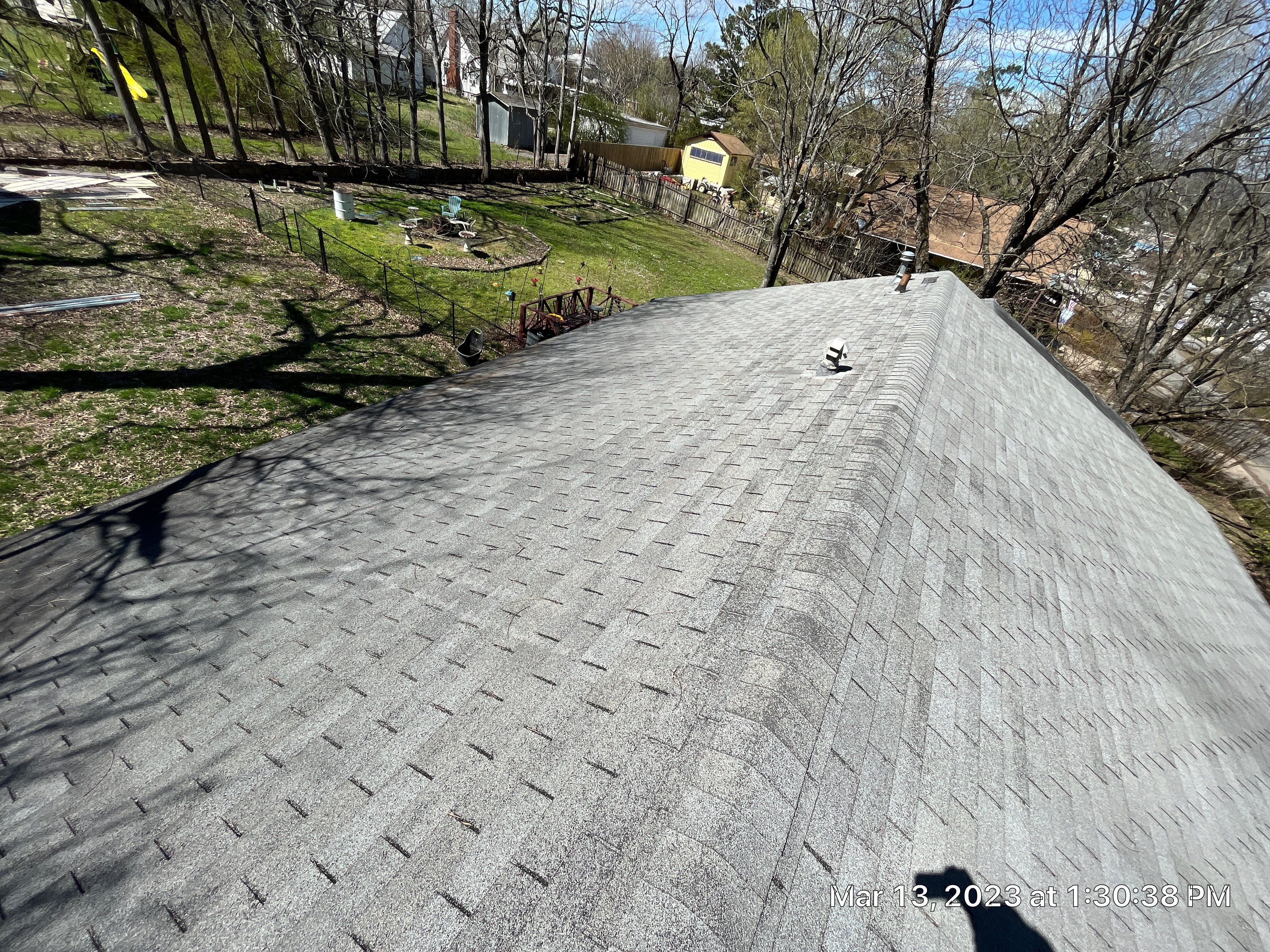 Residential Roofing Installation using 26 Gauge Colored Panels by Hostetler Roofing