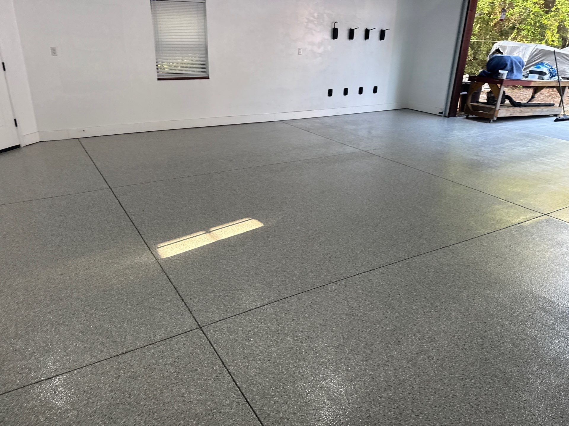 Garage Project in Mount Everest by Cross Creek Concrete Coatings