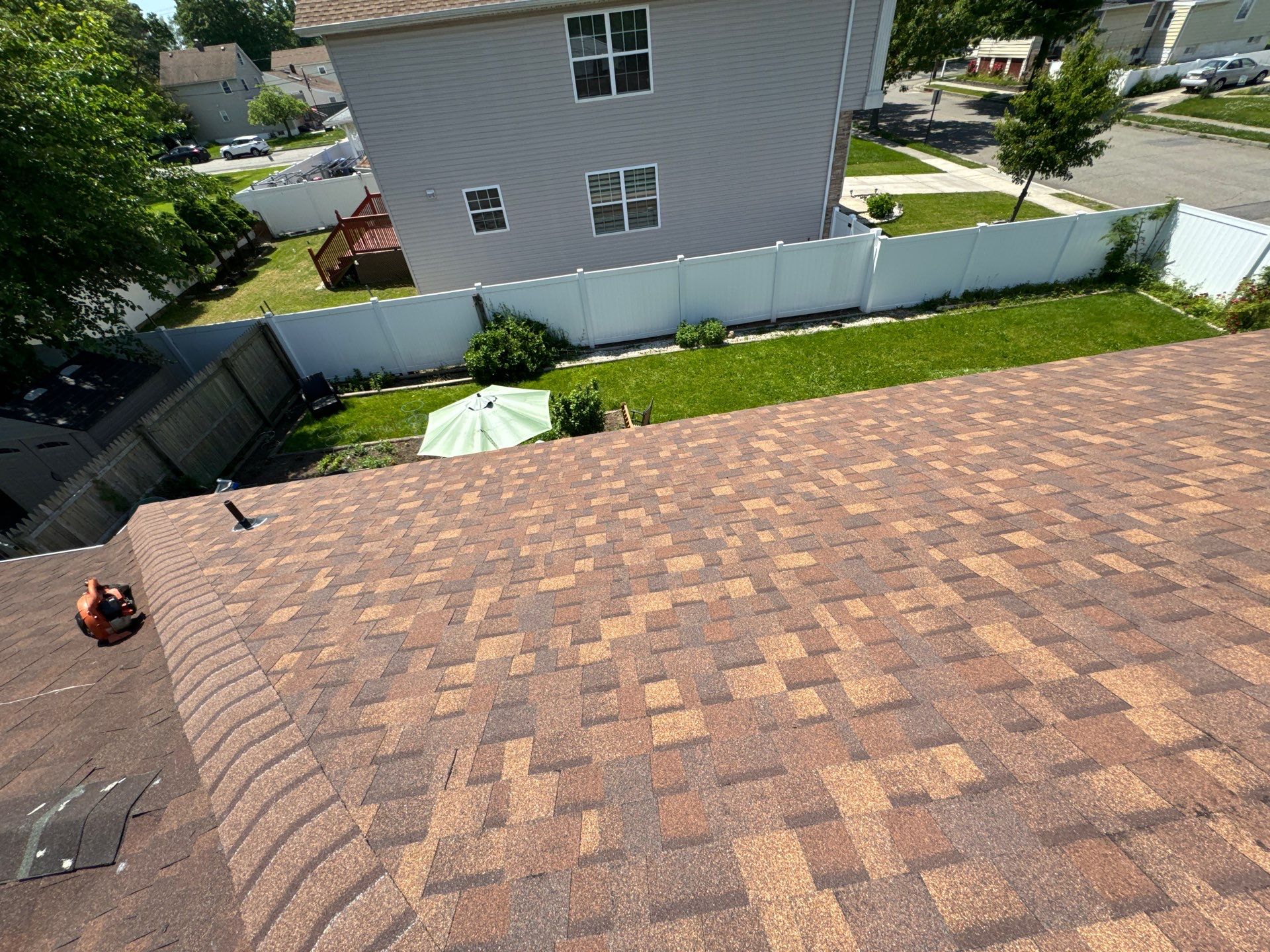 Brownwood Shingles by Reimagine Roofing