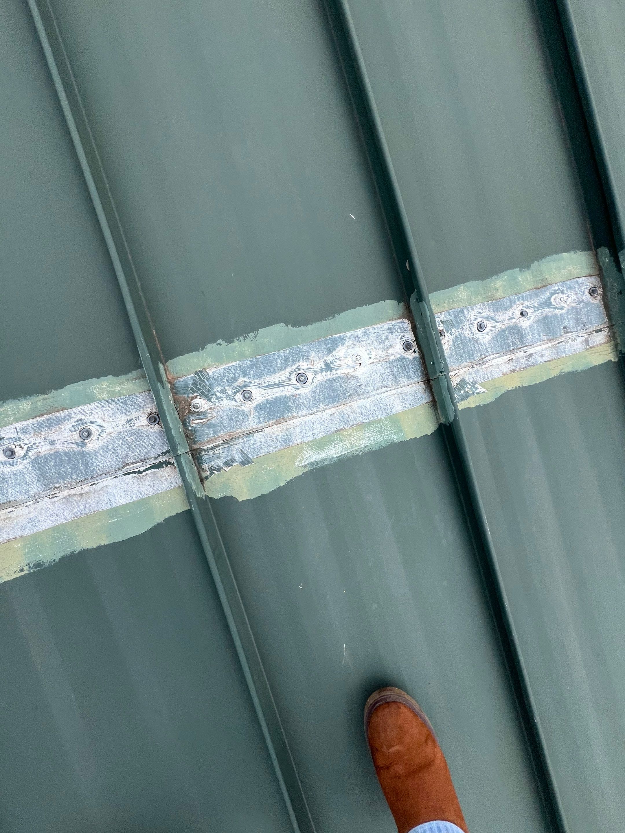 Hail Damage using Metal by Roof Repair Company
