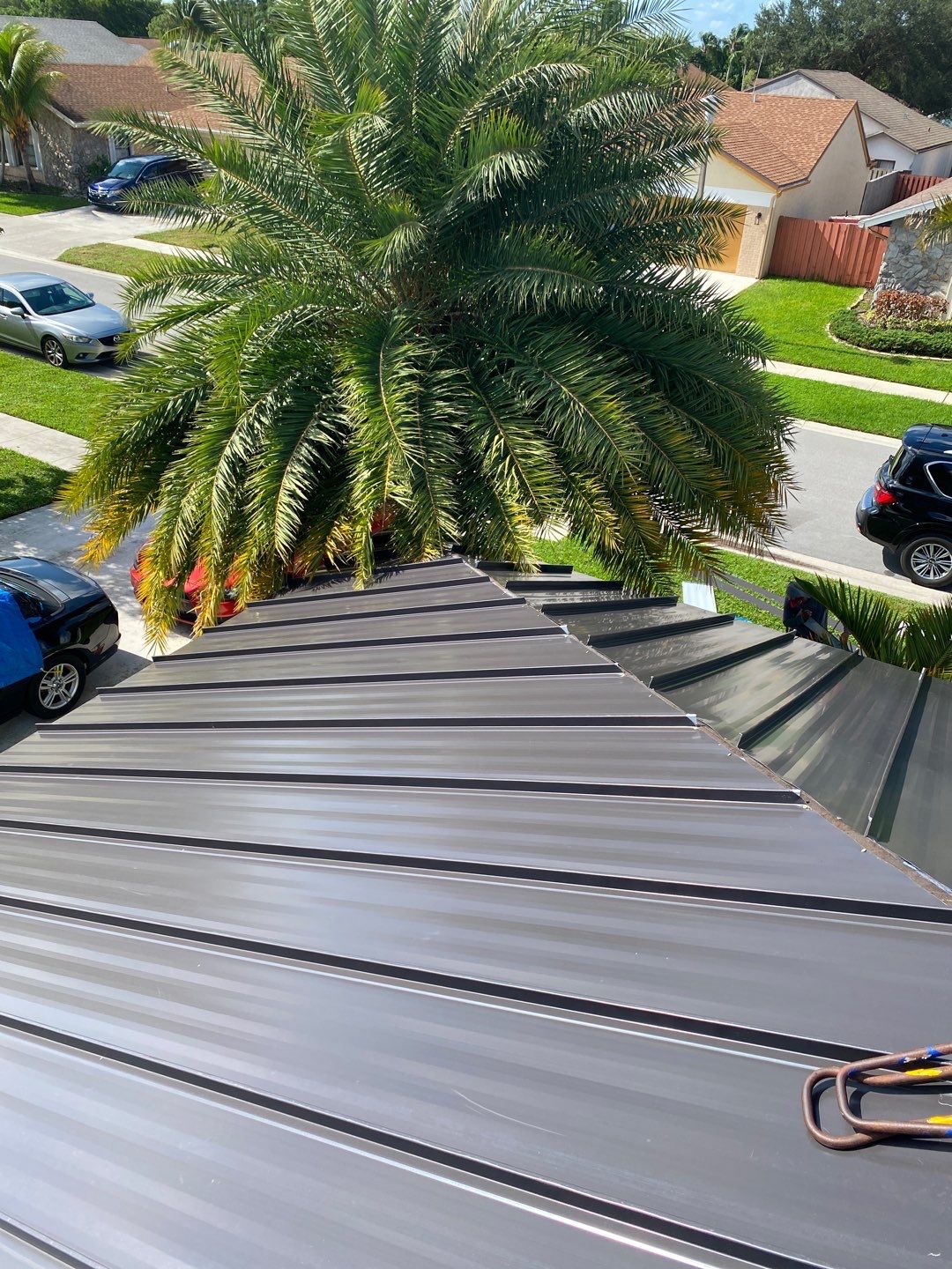 Residential Roofing Installation using 1" Nail strip metal roof by BLUES BROTHERS ROOFING