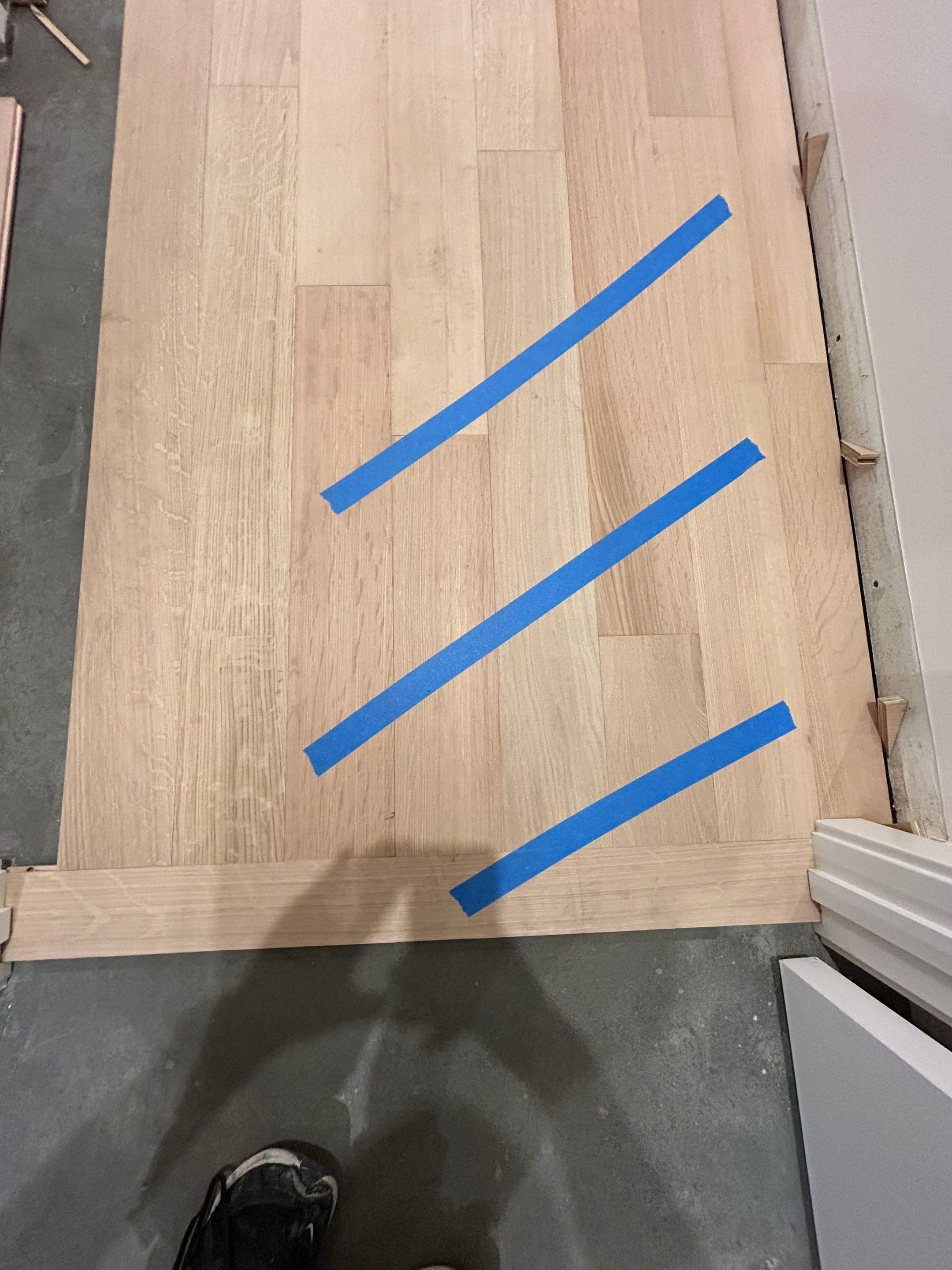 Basement Remodel using Engineered White Oak by RTBaldwin Hardwood Floors