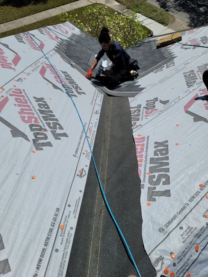 Residential Roofing Installation using Roof Replacement by American Roofing & Construction LLC