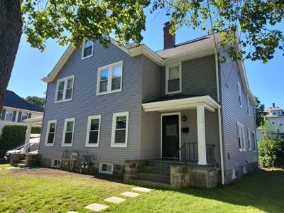 Vinyl siding layover project for 2 family in Wellesley, MA