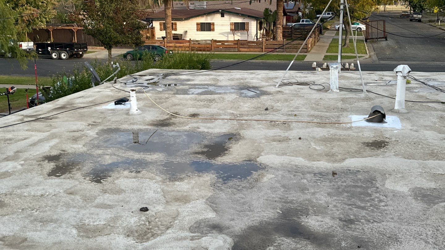 Foam Refurbish using Conklin Benchmark/PUMA XL coatings and spray foam by Straight Edge Roofing Inc