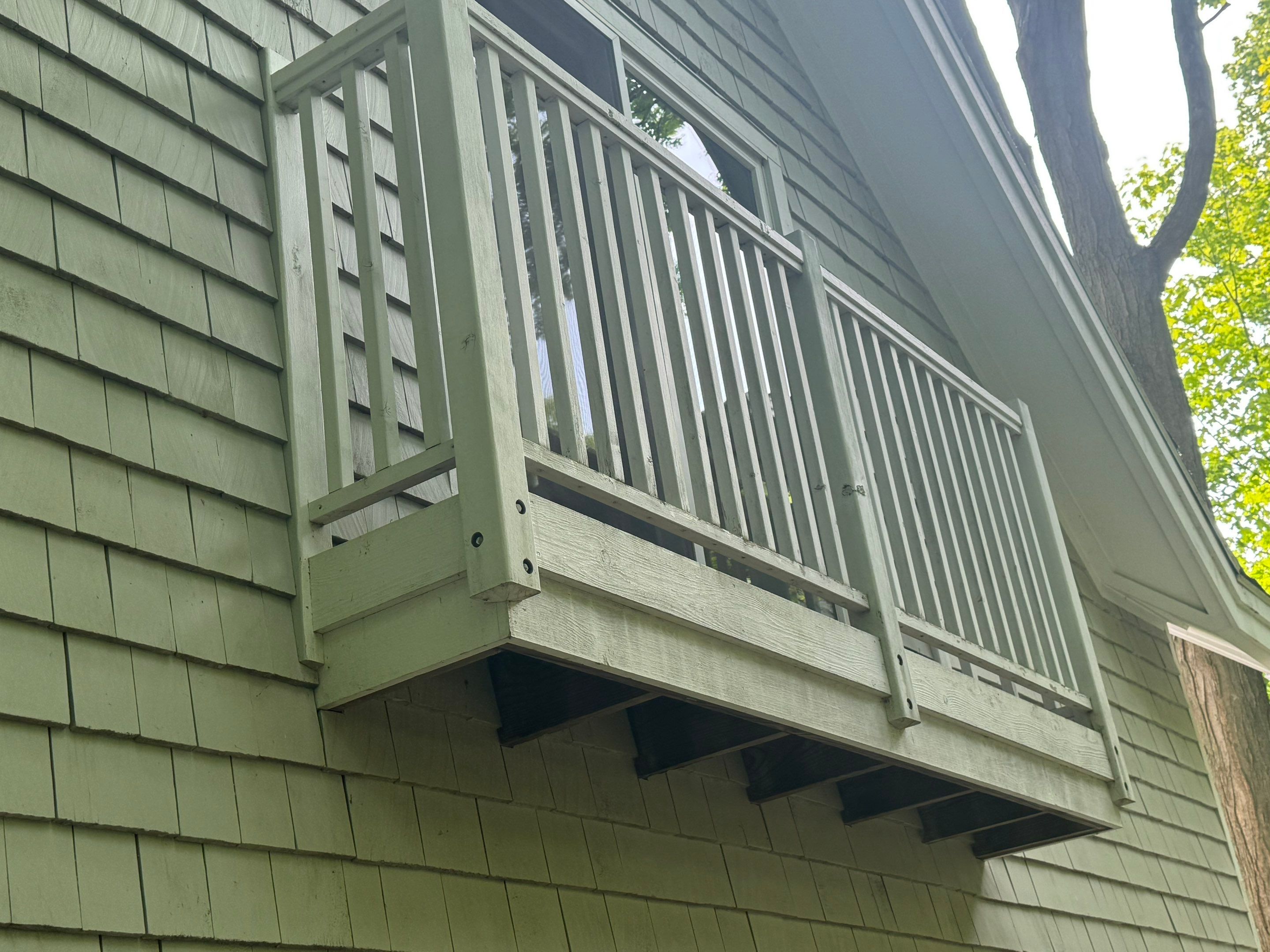 Lakefront Deck Pressure Washing, Exterior Wood Staining, and Painting in West Olive MI by Gordon Painting