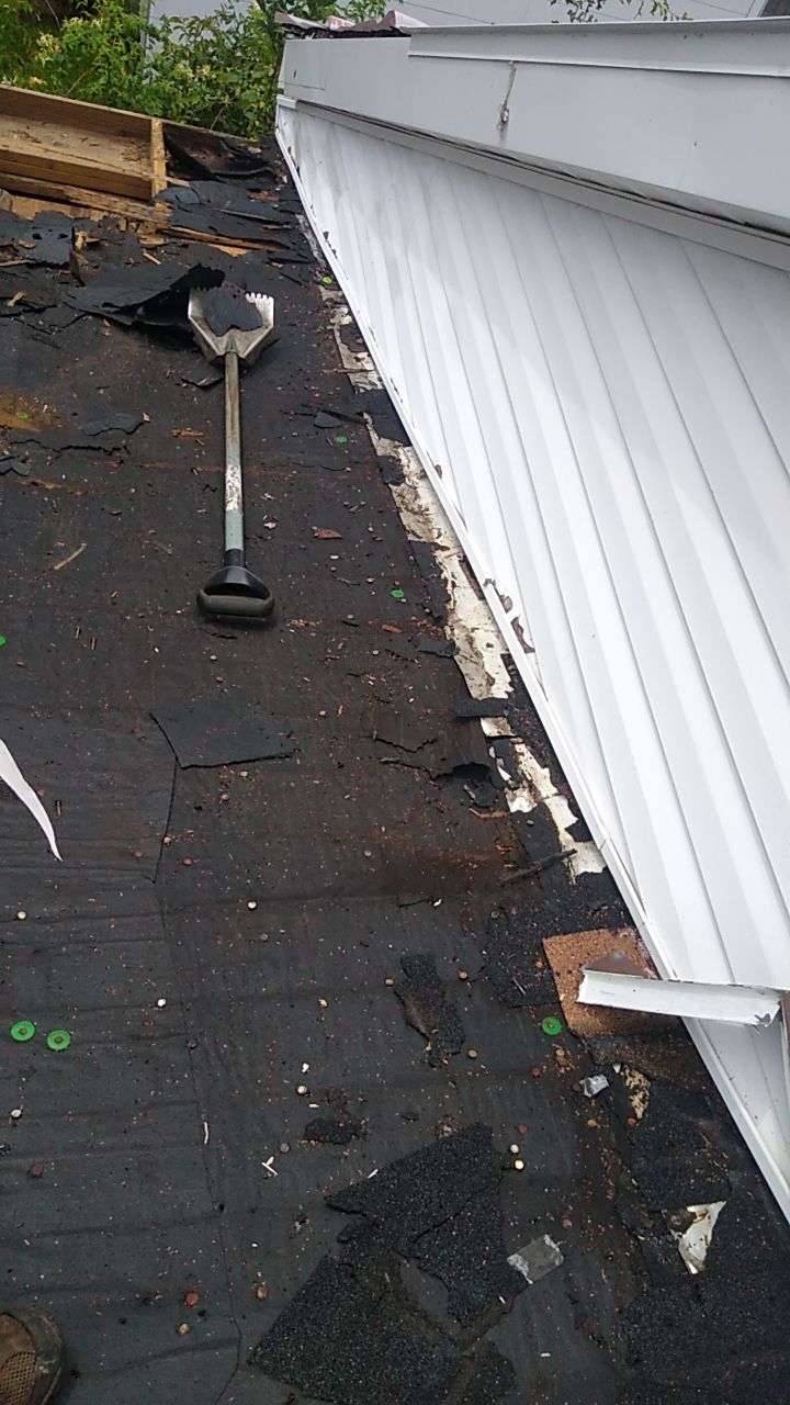 Residential Roofing Installation using Roof Replacement by American Roofing & Construction LLC