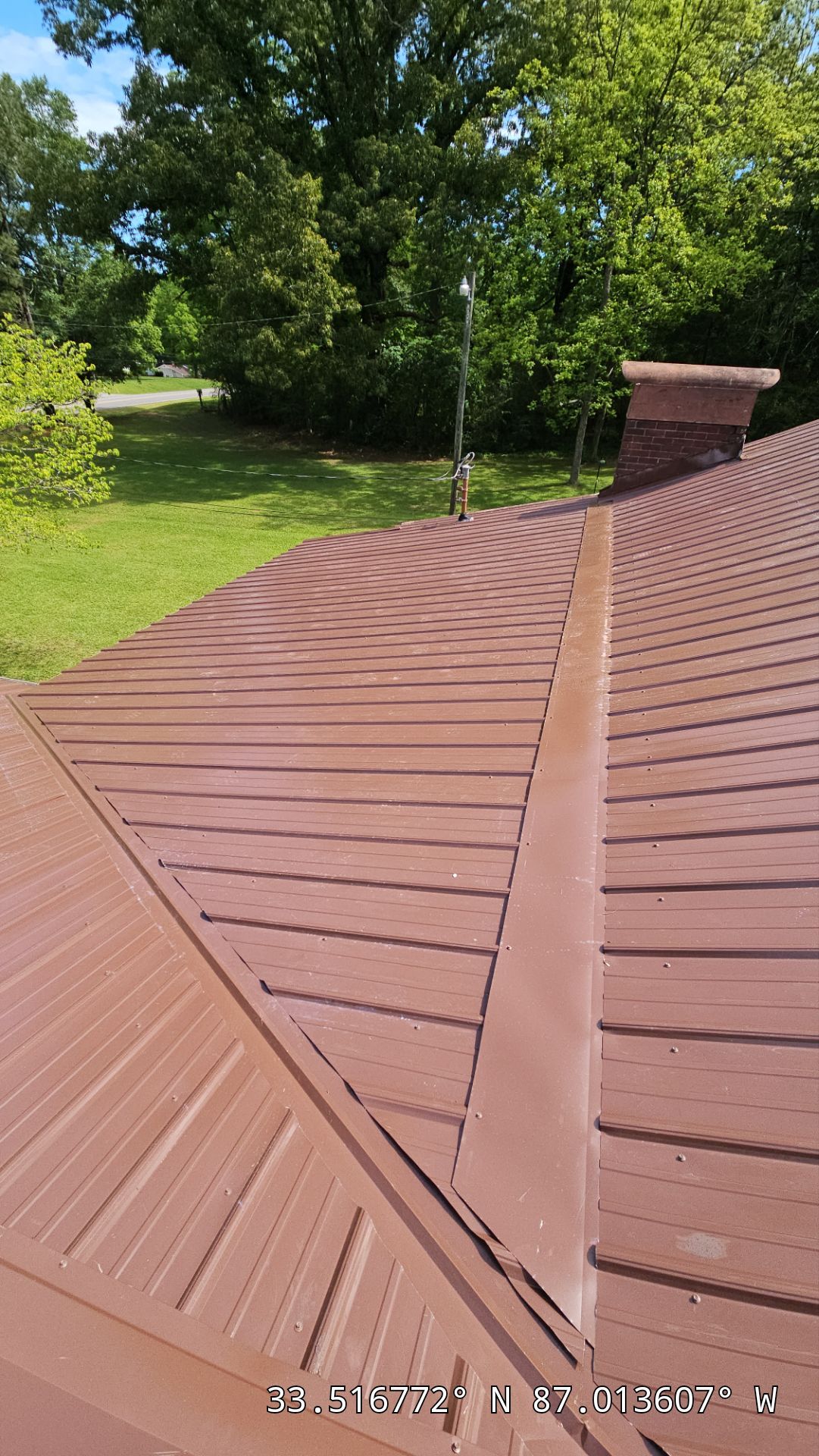 Metal Roof Replacement in Sylvan Springs (Brown) by The Roofing Dudes