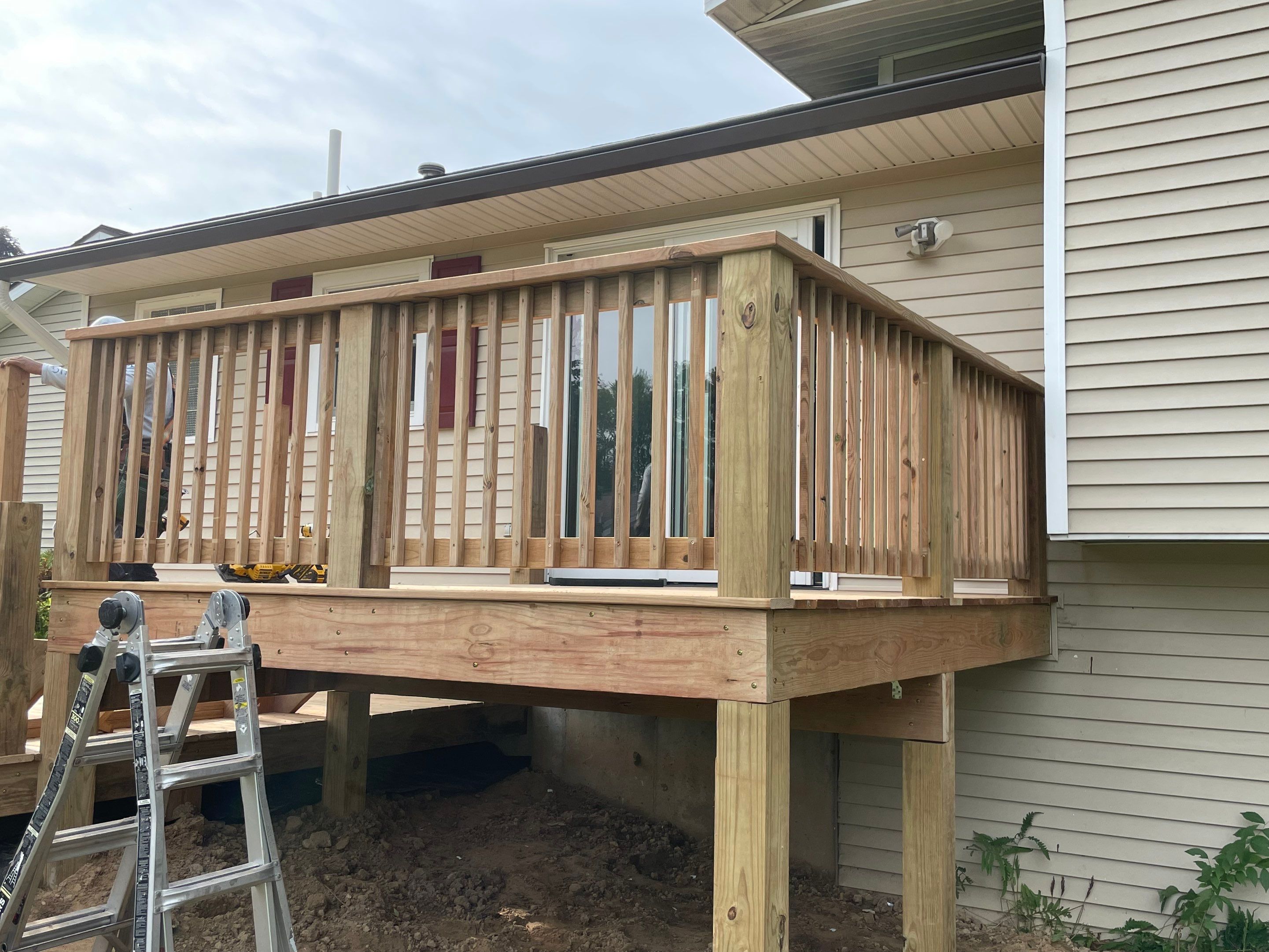 Deck Installation using Treated Lumber by Avalon Roofing and Exteriors