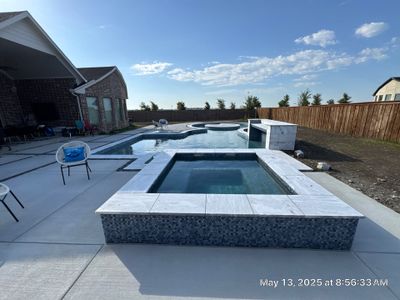 Geometric Pool with Round Raised Spa