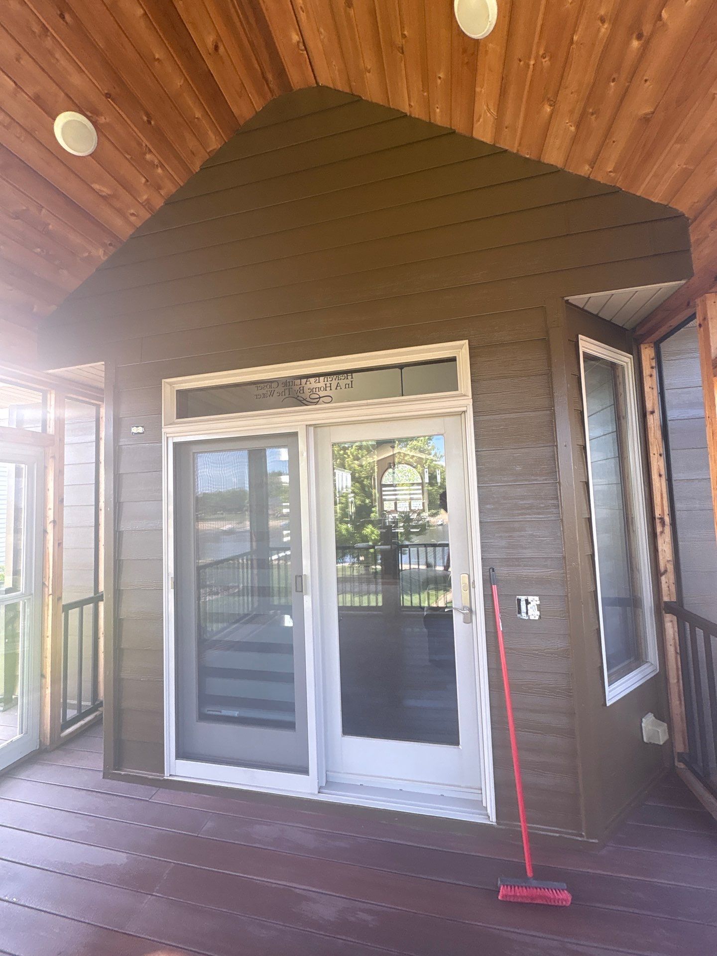 Full Exterior Renovation with Stone Veneer and Composite Decking by Select Painting, Coatings & Garage Cabinets