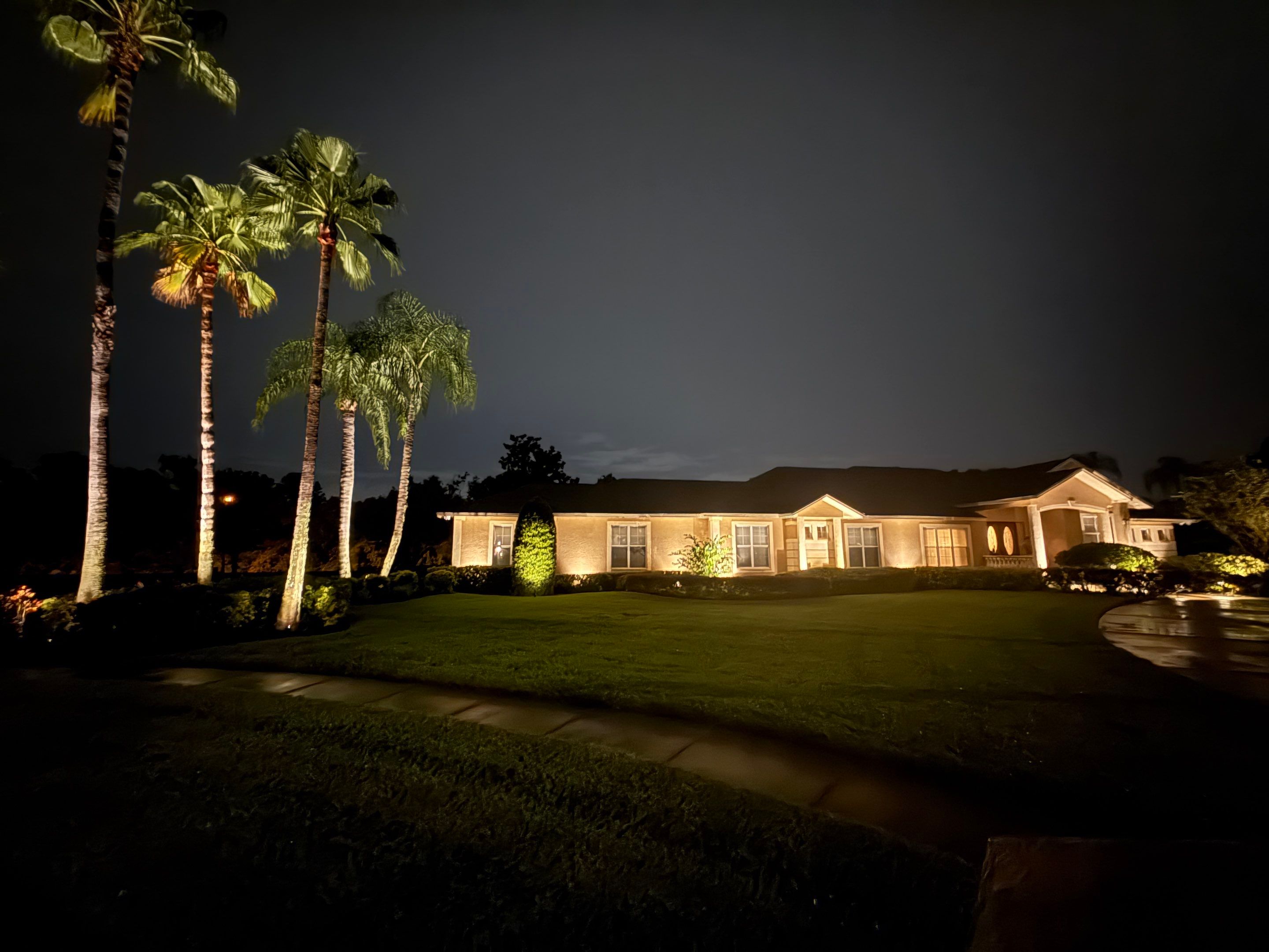 Custom Exterior Landscape Lighting for Residential Estate in Odessa by Elegant Accents