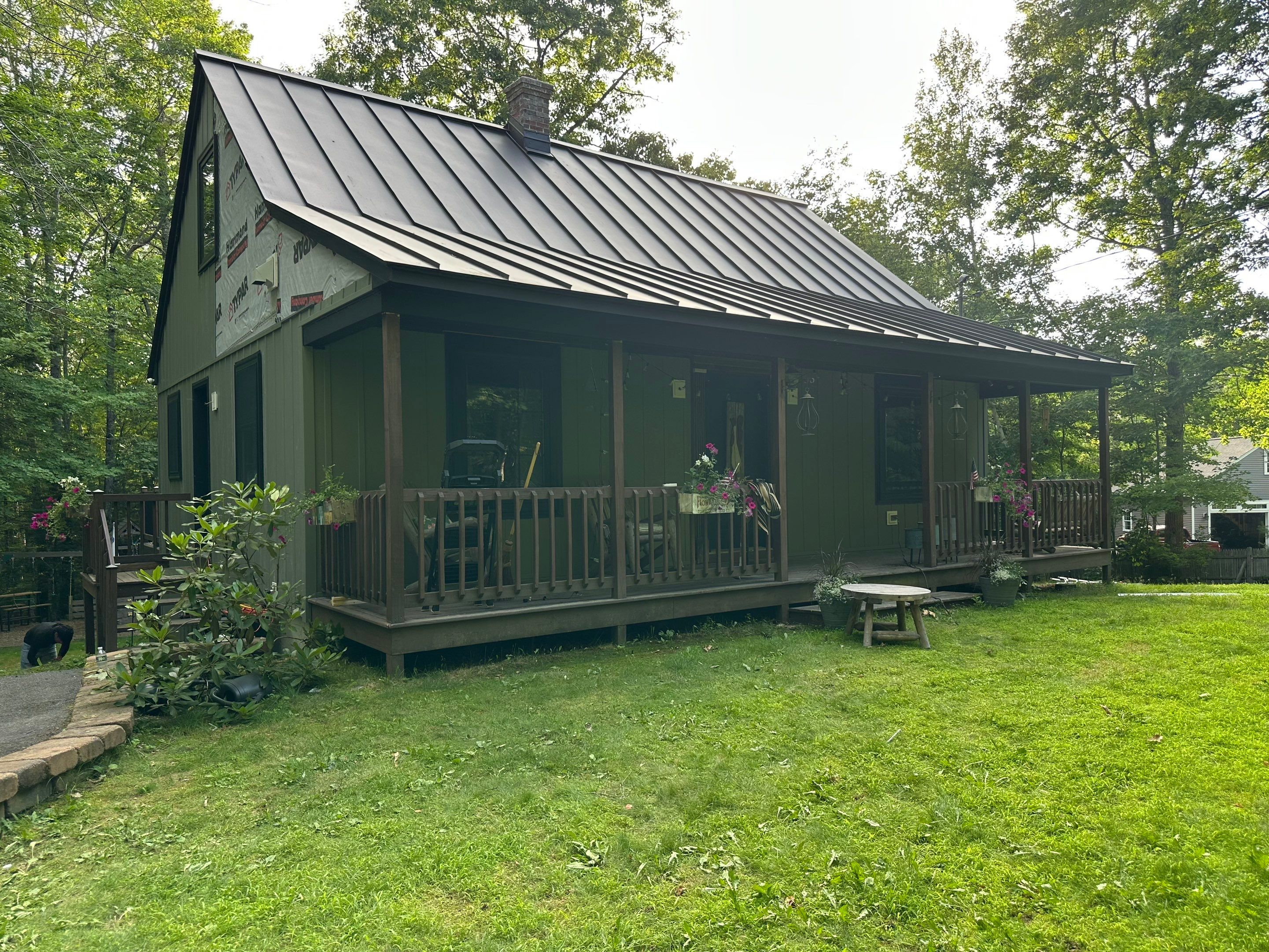 Sage Green Board and Batten Siding and Deck Upgrade in Standish by Tall pine roofing