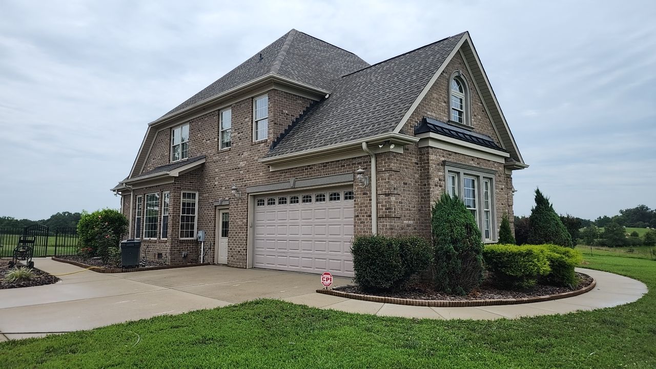 House Wash using cleaner by Power Wash Masters LLC