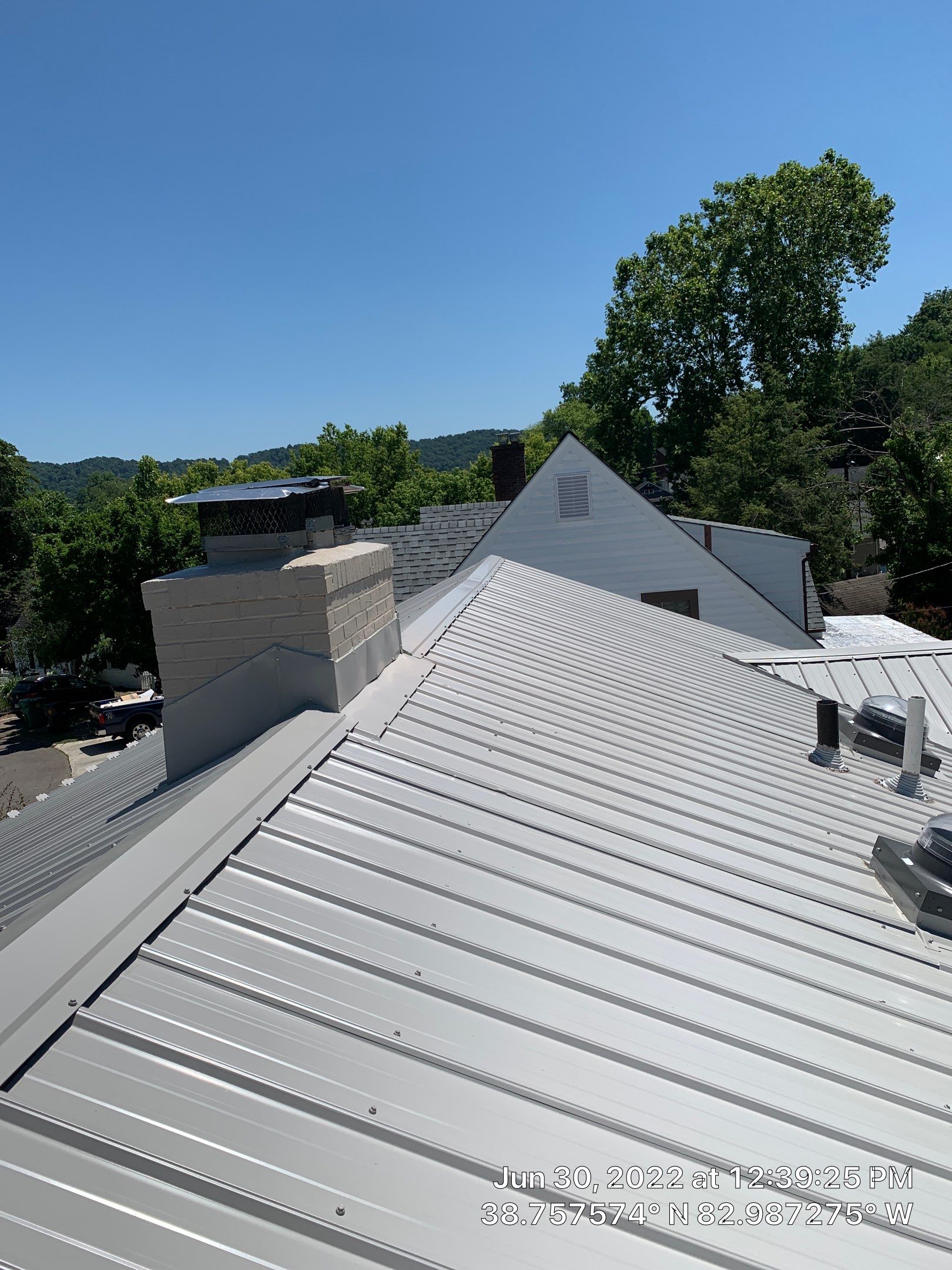 Metal Roofing, Skylights, Porch Build by Secure Construction Company Inc