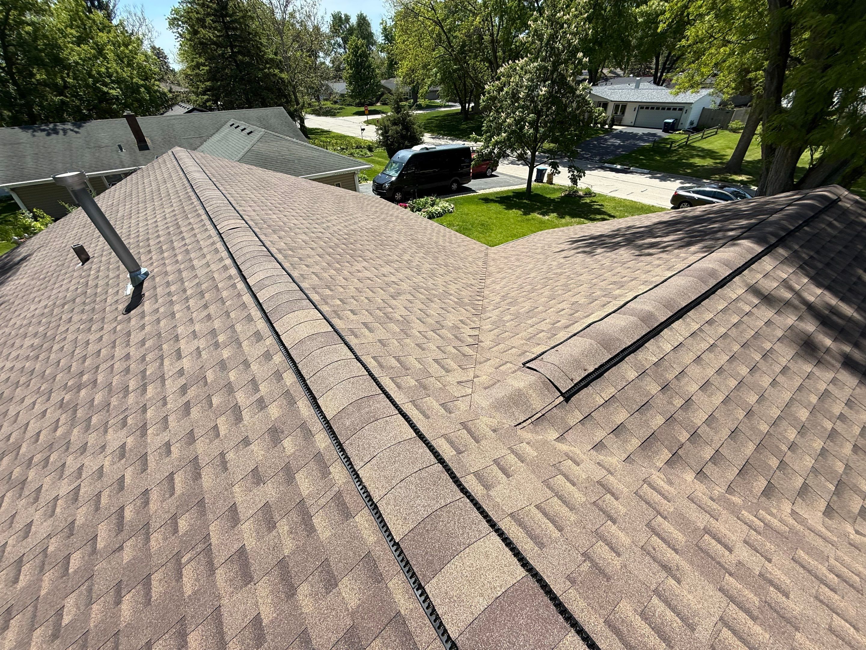 Roof replacement by Optimal Home Improvement 