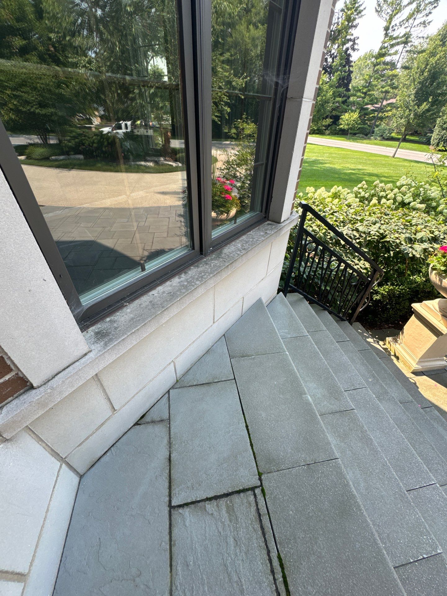 natural stone using Algaecide, soft wash soap by Northern Power Washing LLC.